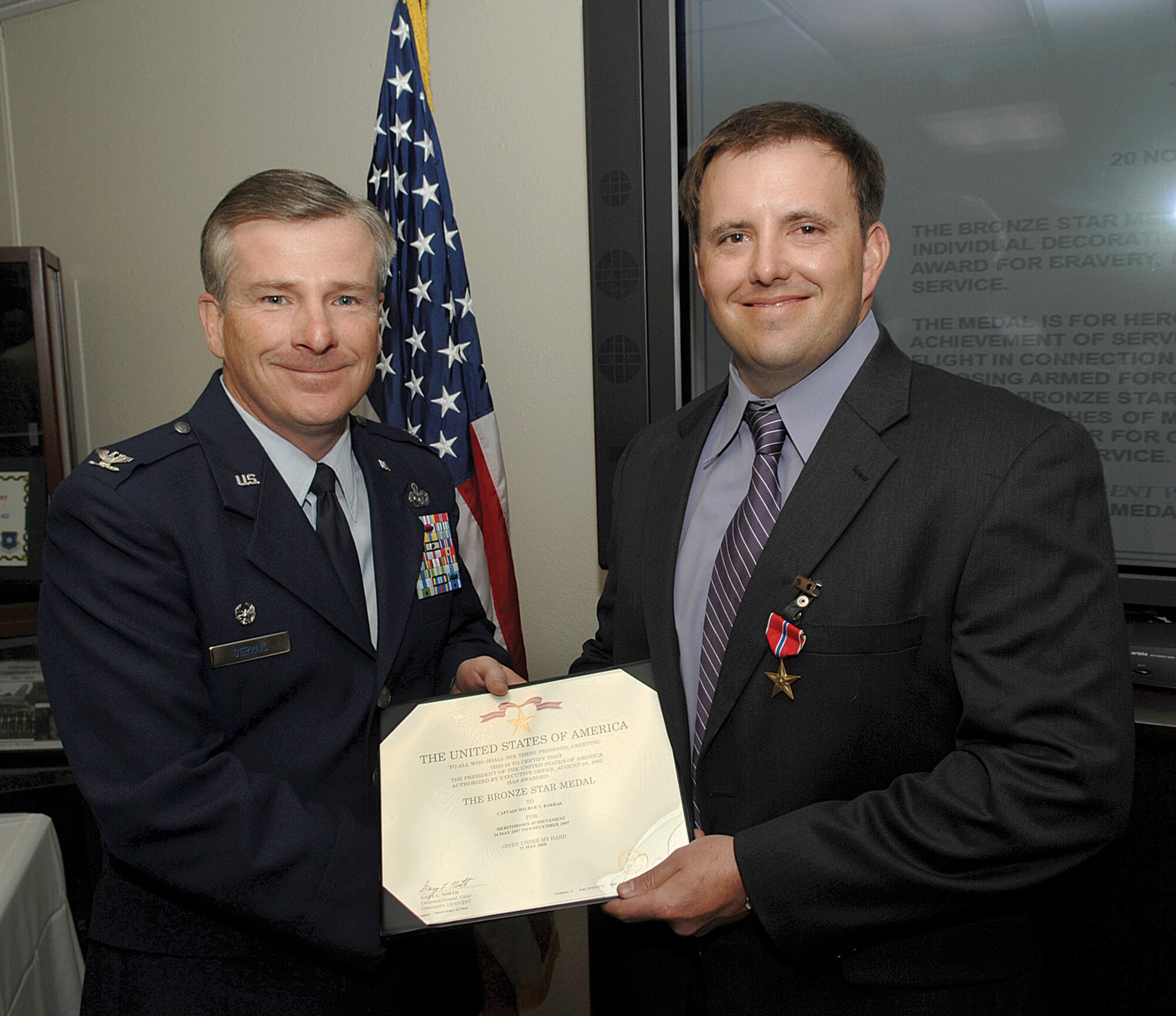 Special Agent Wilbur Barras was awarded the Bronze Star by Col. Dennis Gervais, Air Force Office of Special Investagations, Region 4 commander, Nov. 20 at Luke.