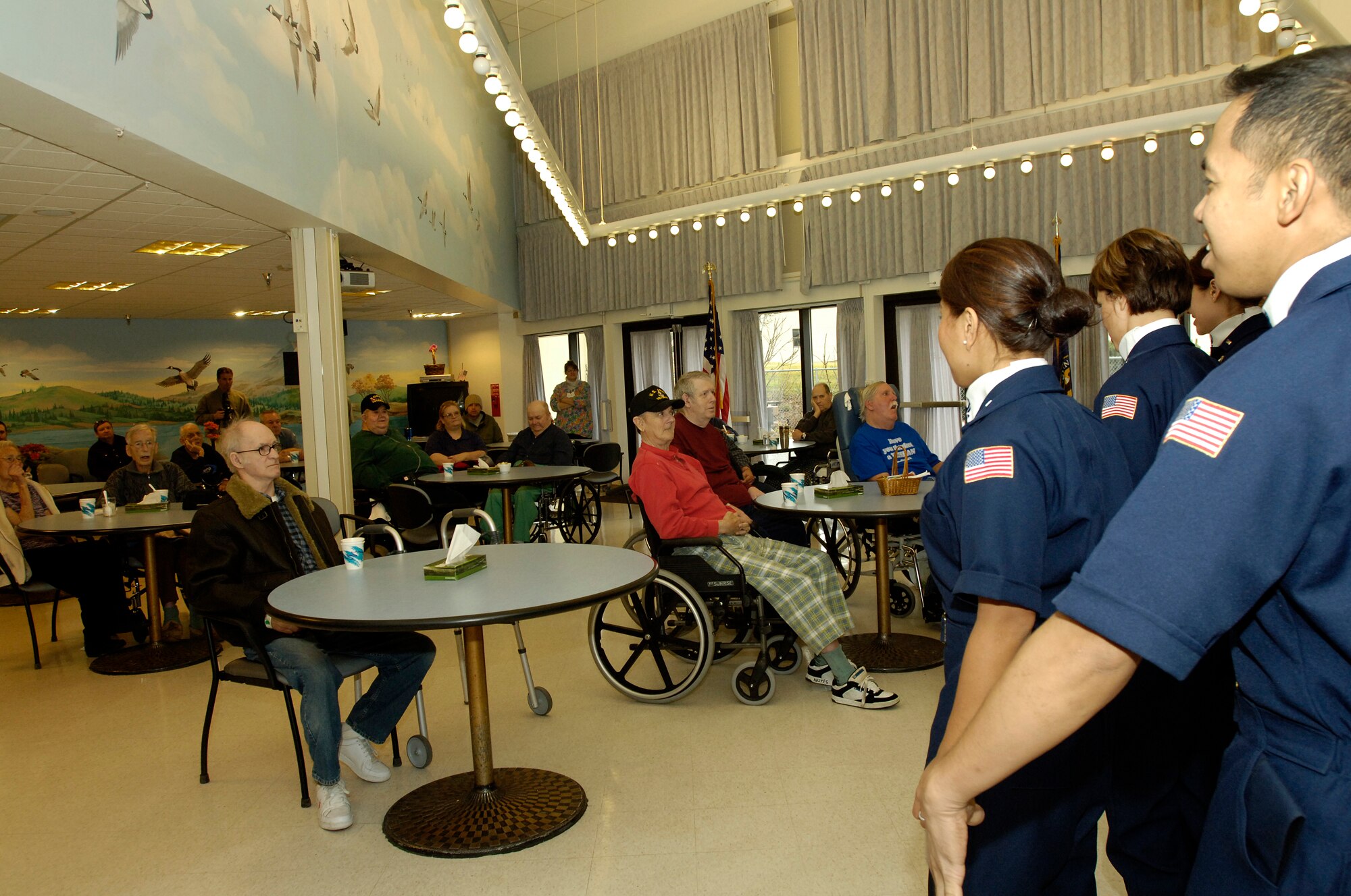 FAIRCHILD AIR FORCE BASE, Wash. – Members of the Air Force Tops In Blue perform for a group at the Veterans Administration Hospital Dec 2. Along with their stop at Fairchild and other U.S. bases, Tops in Blue will venture the world entertaining forward-deployed troops in various locations, including Iraq, Qatar, Afghanistan and Kuwait. (U.S. Air Force photo / Senior Airman Eunique Stevens)