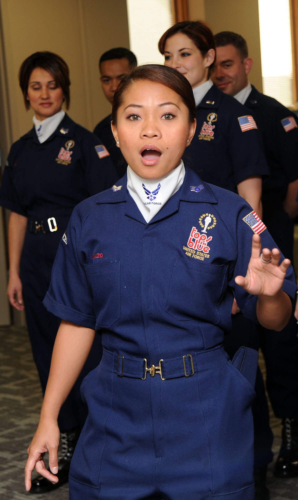 FAIRCHILD AIR FORCE BASE, Wash. – Senior Airman Cristy Lagazo, 92nd Aeromedical Dental Squadron public health journeyman, performs for home-station peers at the 92nd Medical Group Public Health Office.  Airman Lagazo is currently travelling the globe with Tops in Blue, an Air Force travelling performance group. (U.S. Air Force photo / Staff Sgt. JT May III)
