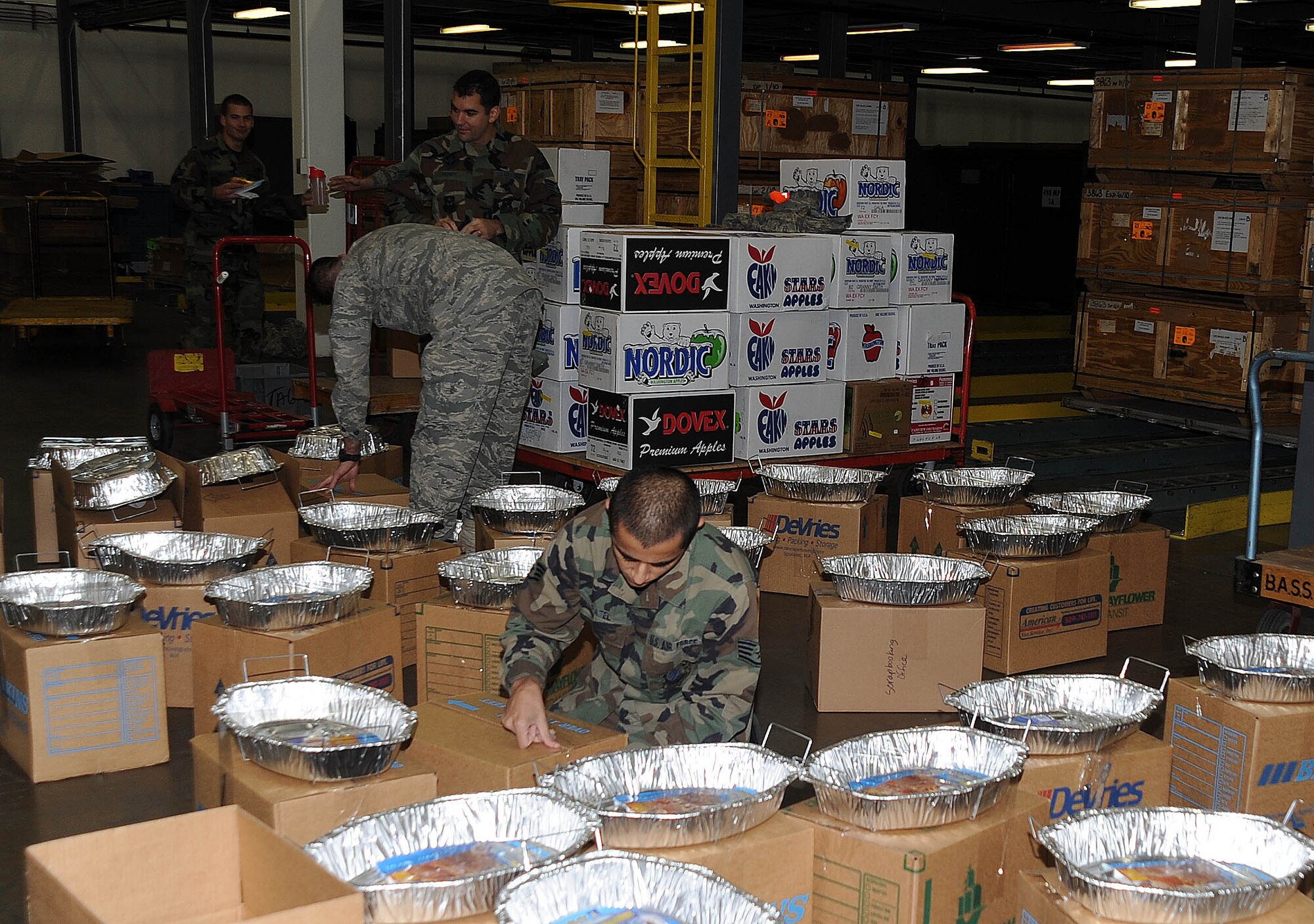 FAIRCHILD AIR FORCE BASE, Wash. – First Sergeants Council and Team Fairchild members assembled 117 boxes which housed complete Thanksgiving meals in support of Operation Warm Heart. Operation Warm Heart is a Fairchild First Sergeants Council community outreach program designed to support Airmen during the holiday season. (U.S. Air Force photo / Staff Sgt. JT May III) 