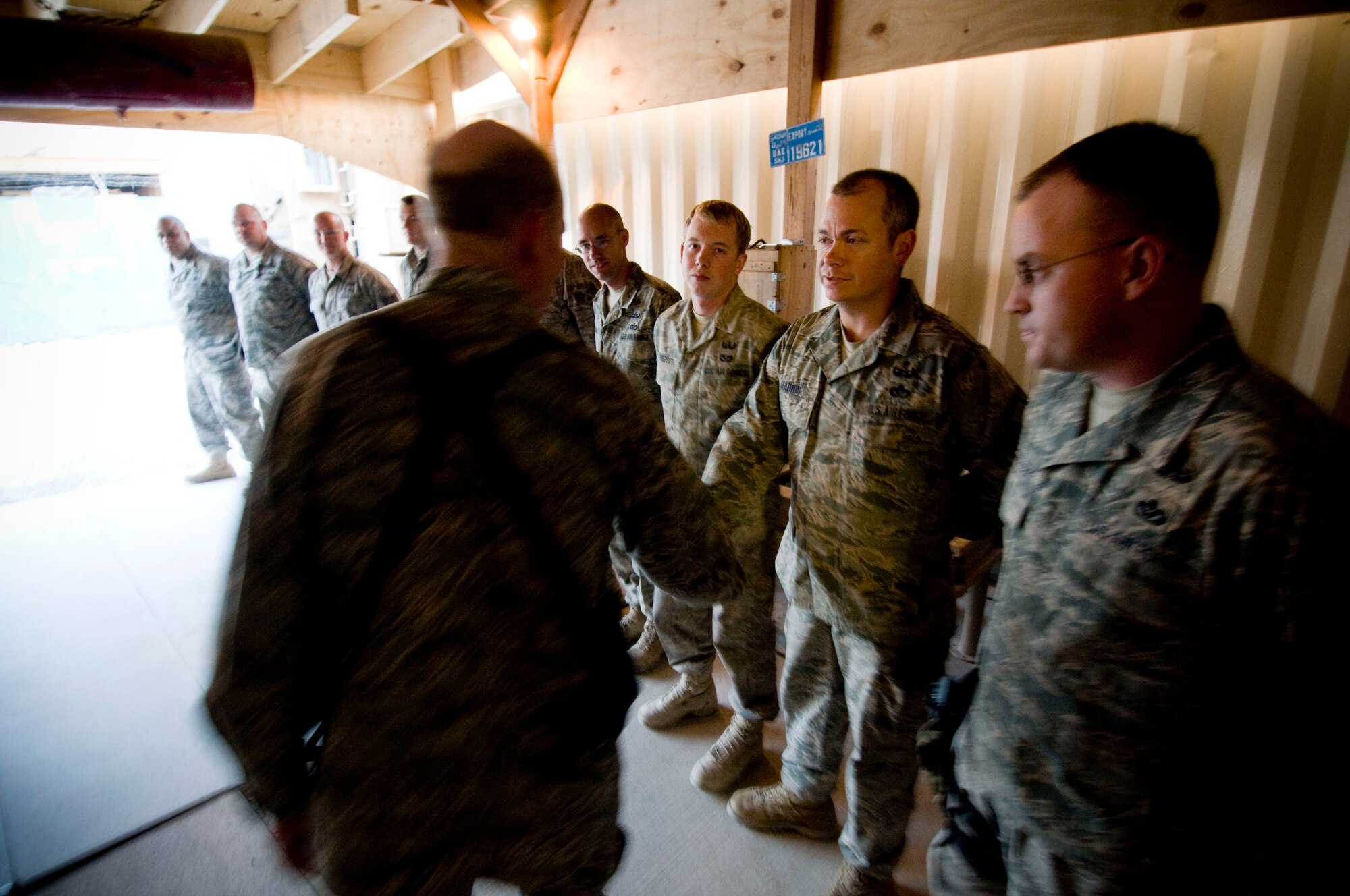 Gen. John Corley, Air Combat Command commander, shakes hands with Master Sgt. Cayle Harris, 755th Air Expeditionary Group Explosive Ordinance Disposal team leader, at Bagram Air Field, Afghanistan, Dec. 4. General Corley addressed questions about the promised pay incentives for the Air Force EOD technicians. Sergeant Harris is from Roosevelt, Utah. (U.S. Air Force photo by Staff Sgt. Samuel Morse)(Released)