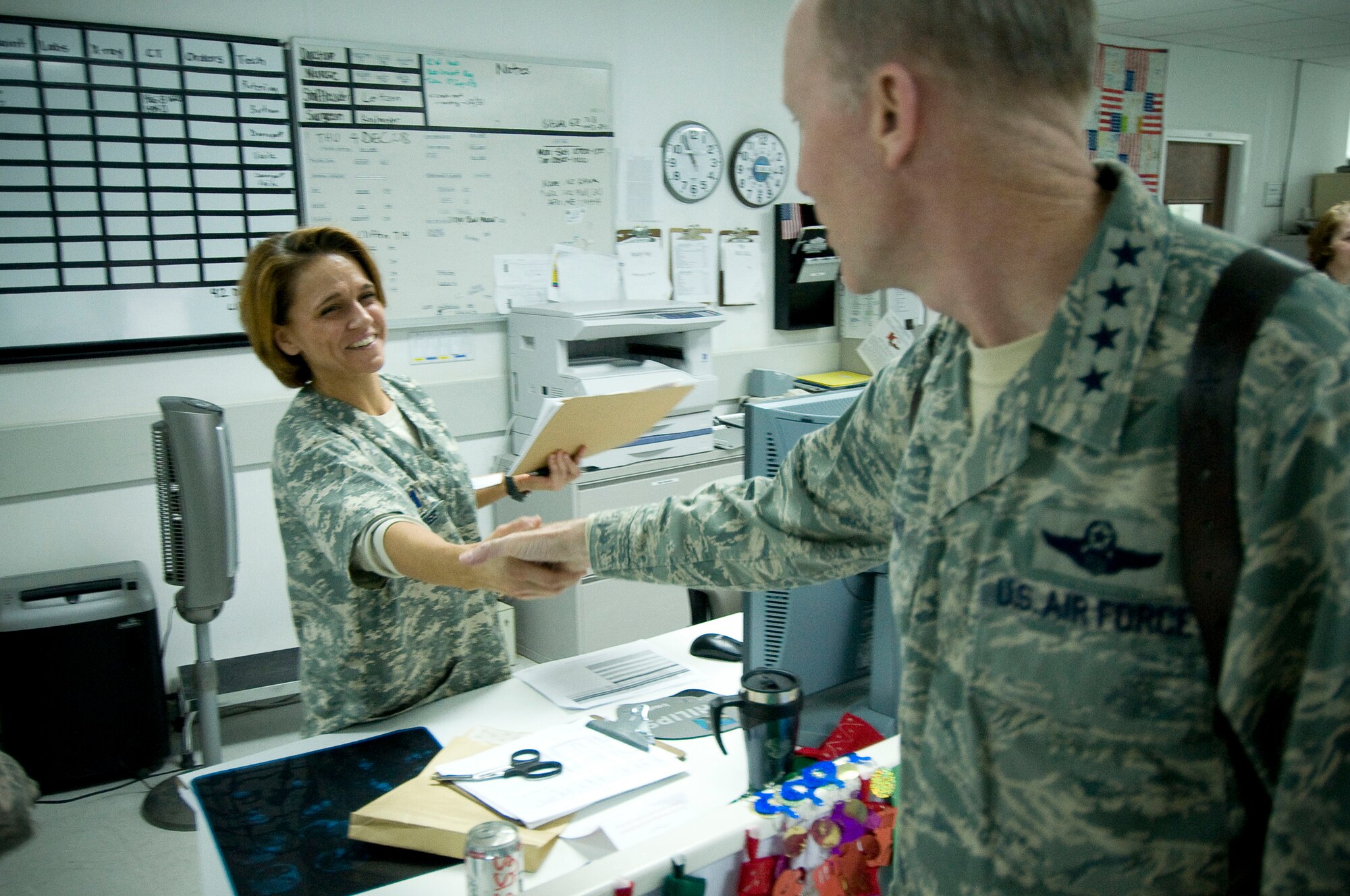Gen. John Corley, Air Combat Command commander, shakes hands with Capt. Melissa Buzbee, 455th Expeditionary Medical Group,  at Bagram Air Field, Afghanistan, Dec. 4. General Corley did not limit his visit to just Airmen filling combat-centric roles, but visited the medical and support groups, among others. (U.S. Air Force photo by Staff Sgt. Samuel Morse)(Released)