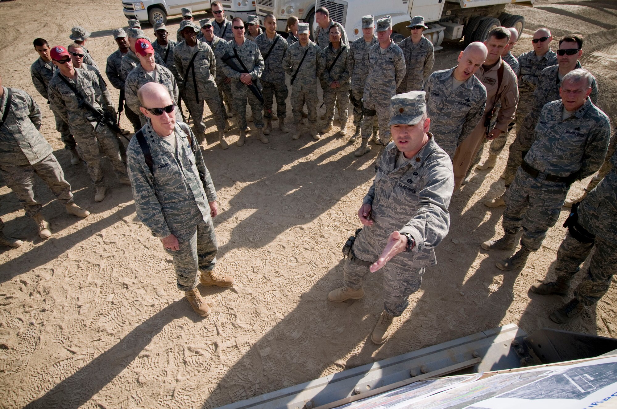 Maj. Oscar Betancourt, 455th Expeditionary Civil Engineer Squadron commander, briefs Gen. John Corley, Air Combat Command commander, at Bagram Air Field, Afghanistan, Dec. 4. Major Betancourt talked about the challenges his squadron is facing with the large-scale flightline expansion projects going on at Bagram Air Field. (U.S. Air Force photo by Staff Sgt. Samuel Morse)(Released)