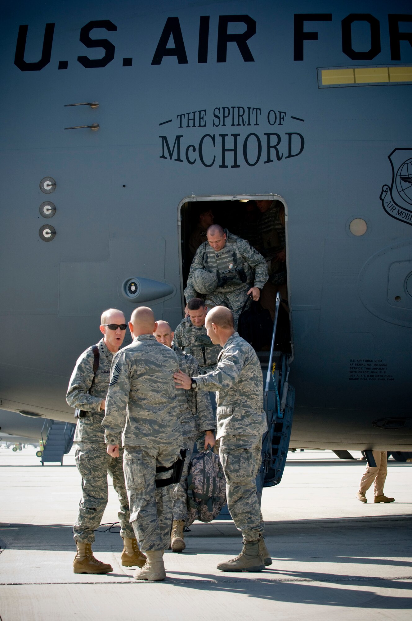 Gen. John Corley, Air Combat Command commander, arrives at Bagram Air Field, Afghanistan, Dec. 4. Brig. Gen. Mike Holmes, 455th Air Expeditionary Wing commander, and Command Chief Master Sgt. Dennis Vannorsdall greeted him at the plane. (U.S. Air Force photo by Staff Sgt. Samuel Morse)(Released)