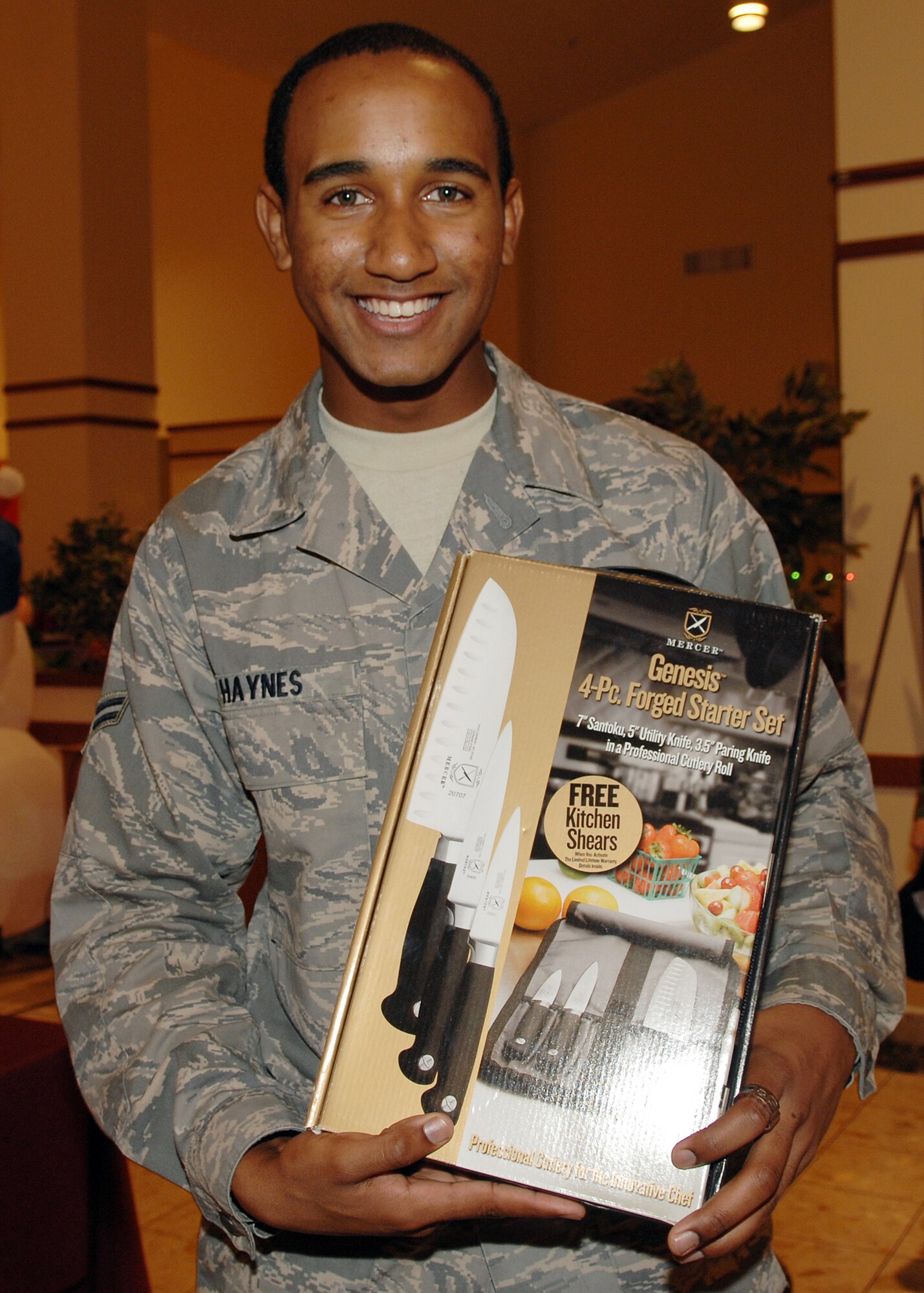 AVIANO AIR BASE, Italy -- Airman First Class Shaun Haynes, 31st Force Support Squadron was the winner of the first Aviano Top Chef competition Dec. 5. Airman Haynes  squeaked out a one-point victory, claiming the Aviano Top Chef victory, a one-day pass and a set of culinary knives. (U.S. Air Force photo/Senior Airman Taylor Marr)