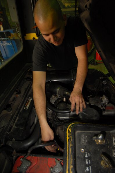 KUNSAN AIR BASE, Republic of Korea -- Staff Sgt. Jason Peters, 8th Logistic Readiness Squadron, vehicle maintenance craftsman, conducts a routine maintenance check on the fuel system of a 6K Hysler fork lift here Dec 4.The Wolf Pack’s vehicle maintenance Airmen are responsible for keeping more than 600 general and special purpose vehicles operational for the Airmen, Soldiers and civilians assigned to the base. (U.S. Air Force photo by: Senior Airman Angela Ruiz)