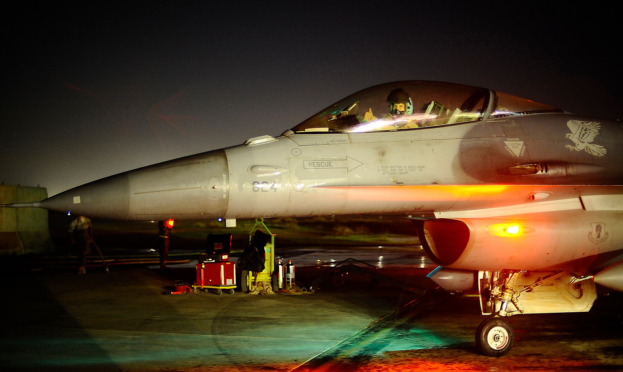 Col. Michael Fantini, the 332nd Operations Group commander, gives a thumbs up at Joint Base Balad, Iraq, after he completed his 3,000th flying hour in an F-16 Fighting Falcon Dec. 2. Cols. John Dolan and David Romuald also completed their 3,000th F-16 flying hour that evening. Approximately 150 F-16 pilots have surpassed this milestone. Dolan is the vice commander of the 332nd Air Expeditionary Wing and Romauld is the 332nd Expeditionary Operations Group deputy commander. (U.S. Air Force photo/Airman 1st Class Jason Epley) (Released)