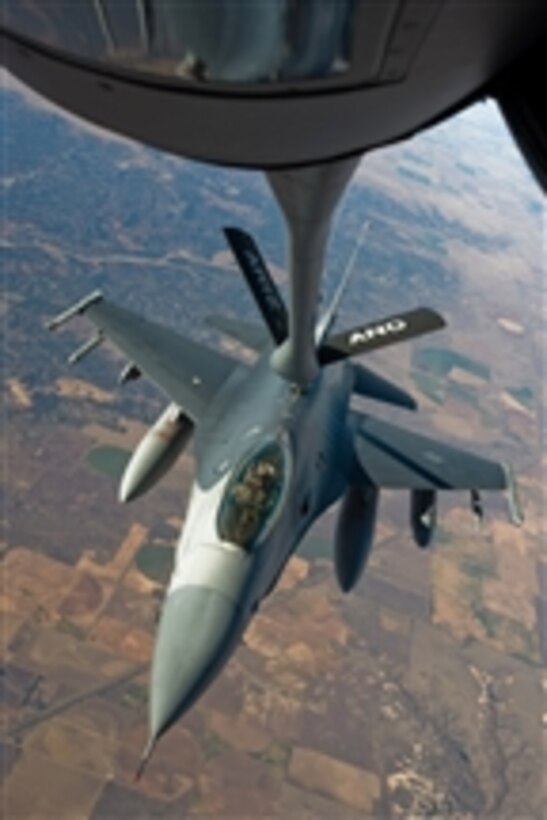 An F-16 Fighting Falcon aircraft from the 120th Fighter Squadron, Colorado Air National Guard waits to take on fuel during a flight over the Southwestern United States on Dec. 1, 2008.  The F-16 is en route to Barksdale Air Force Base, La., to take part in Green Flag East, a pre-deployment exercise for Air Combat Command flying units that perform close-air support and precision-guided munitions delivery.  