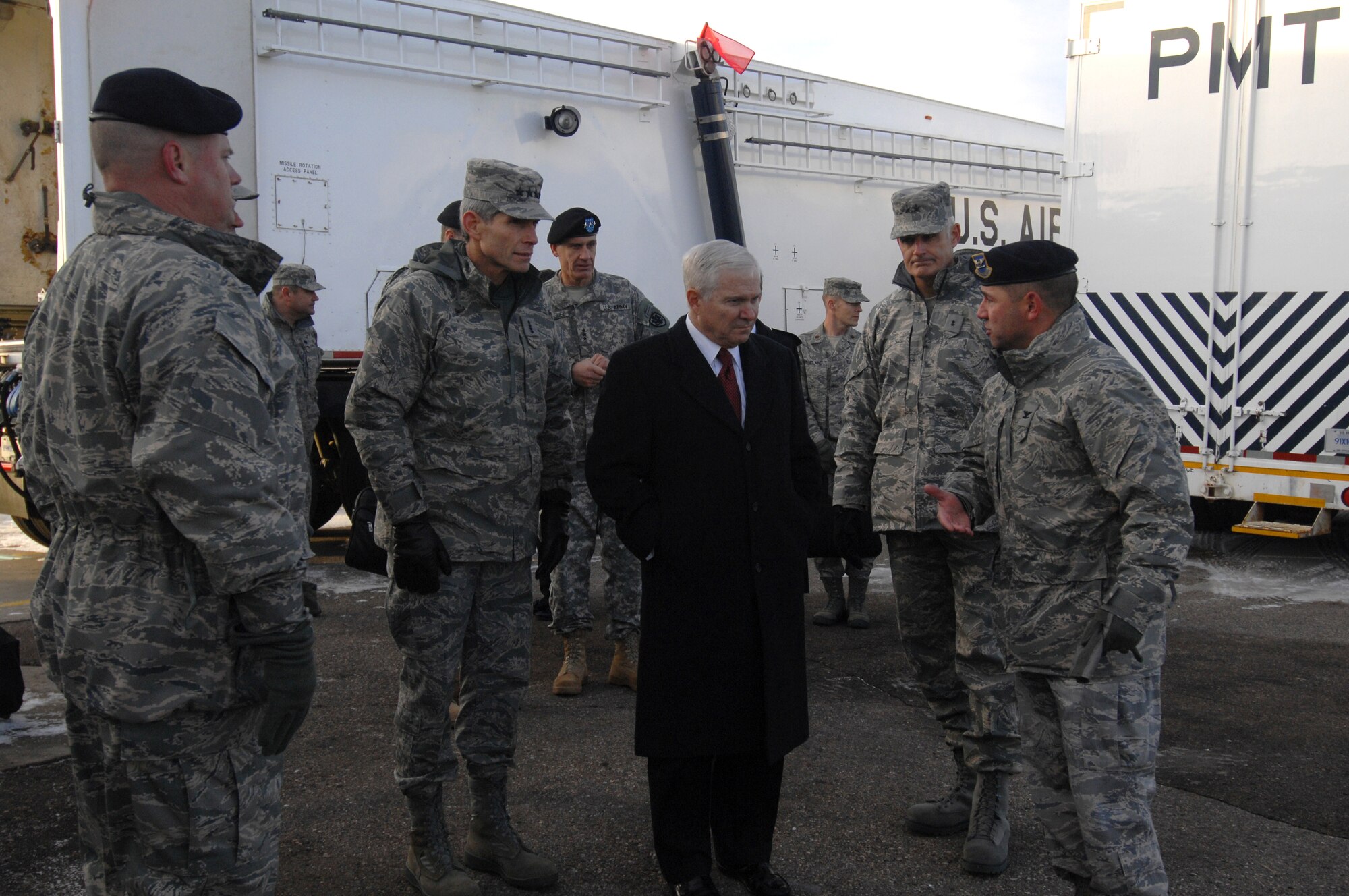 Secretary of Defense Robert M. Gates and Air Force Chief of Staff Gen. Norton Schwartz get briefed Dec. 1 at the Uniform 01 launch facility training site at Minot Air Force Base, N.D. by members of the 91st Missile Wing staff. The 91st MW is one of three Air Force operational intercontinental ballistic missile units.  (U.S. Air Force photo/Senior Airman Kelly Timney)