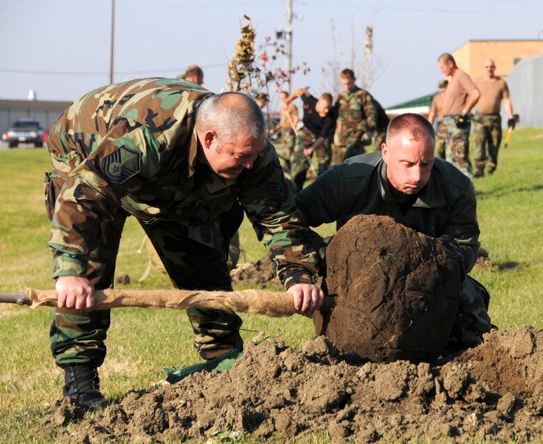 Members of the 185th ARW plant trees at the Sioux City Air National Guard base. Trees planted included Maples, oaks, locus, and crabapples. The project was headed up by the base Civil engineers. 

USAF Photo by: Msgt Vincent De Groot