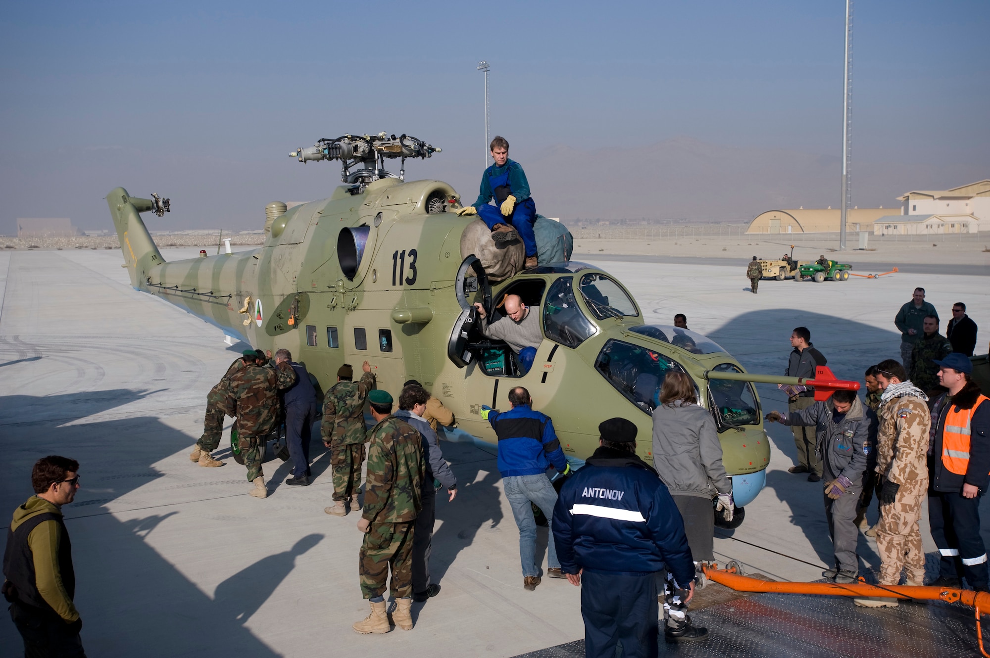 KABUL, Afghanistan -- An Mi-17 helicopter is unloaded from a AH-124 transport plane here. The three refurbished transport helicopters will be added to the Afghan National Army Air Corps fleet, helping the ANAAC conduct a larger portion of the airlift mission to support the Afghan National Army. The ANAAC is being mentored by Airman from the 438th Air Expeditionary Wing, stationed at Kabul. (U.S. Air Force photo/Master Sgt. Keith Brown)
