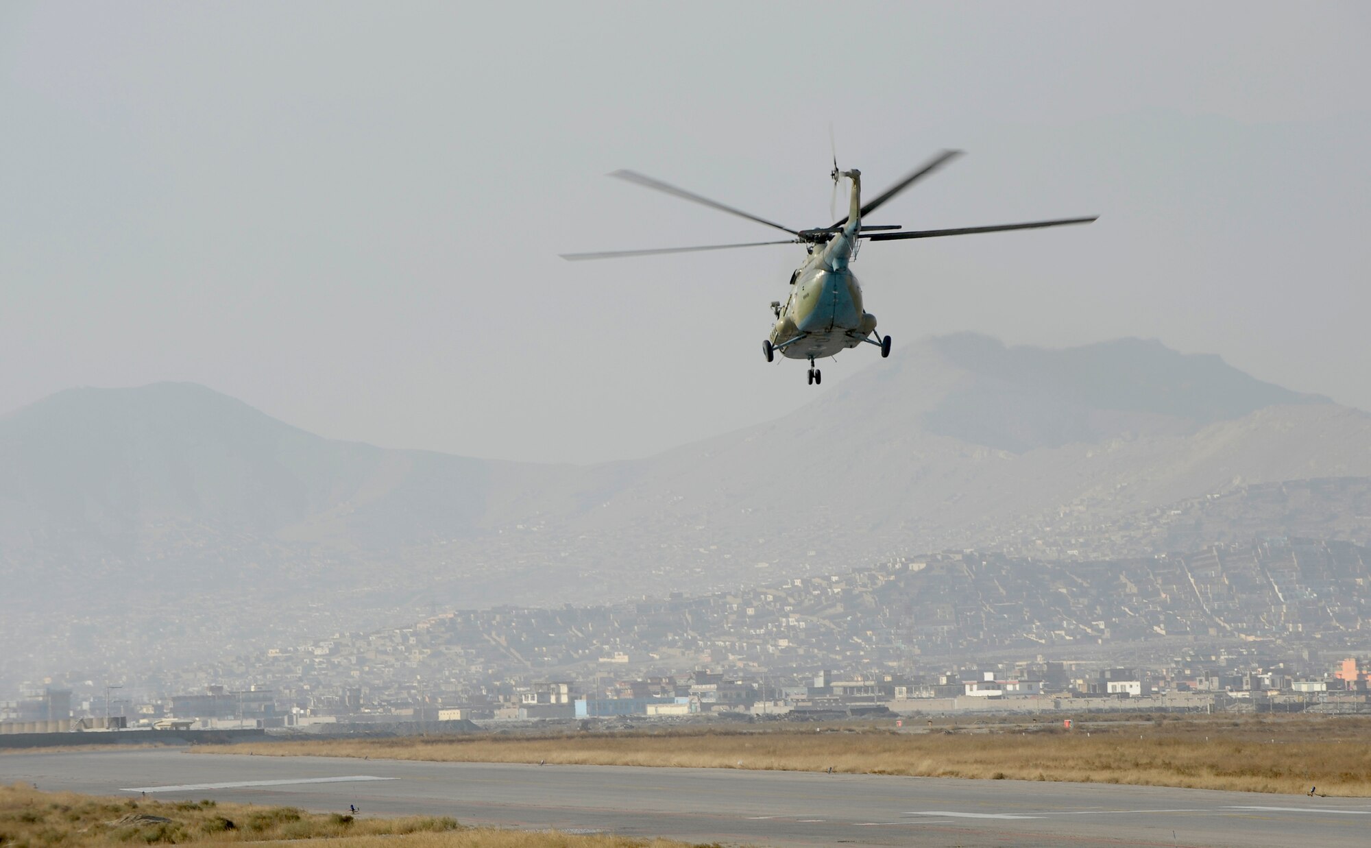 KABUL, Afghanistan -- The Afghan National Army Air Corps received three Mi-17 helicopters, like this one taking off on a mission from Kabul. The new helicopters were refurbished in the Chech Republic and transported here in a contracted AH-124 Russian transport. The three helicopters will add to the ANAAC fleet and help the Air Corps increase their missions supporting the Afghan National Army. The ANAAC is being mentored by Airman from the 438th Air Expeditionary Wing here.
(U.S. Air Force photo/Master Sgt. Keith Brown)