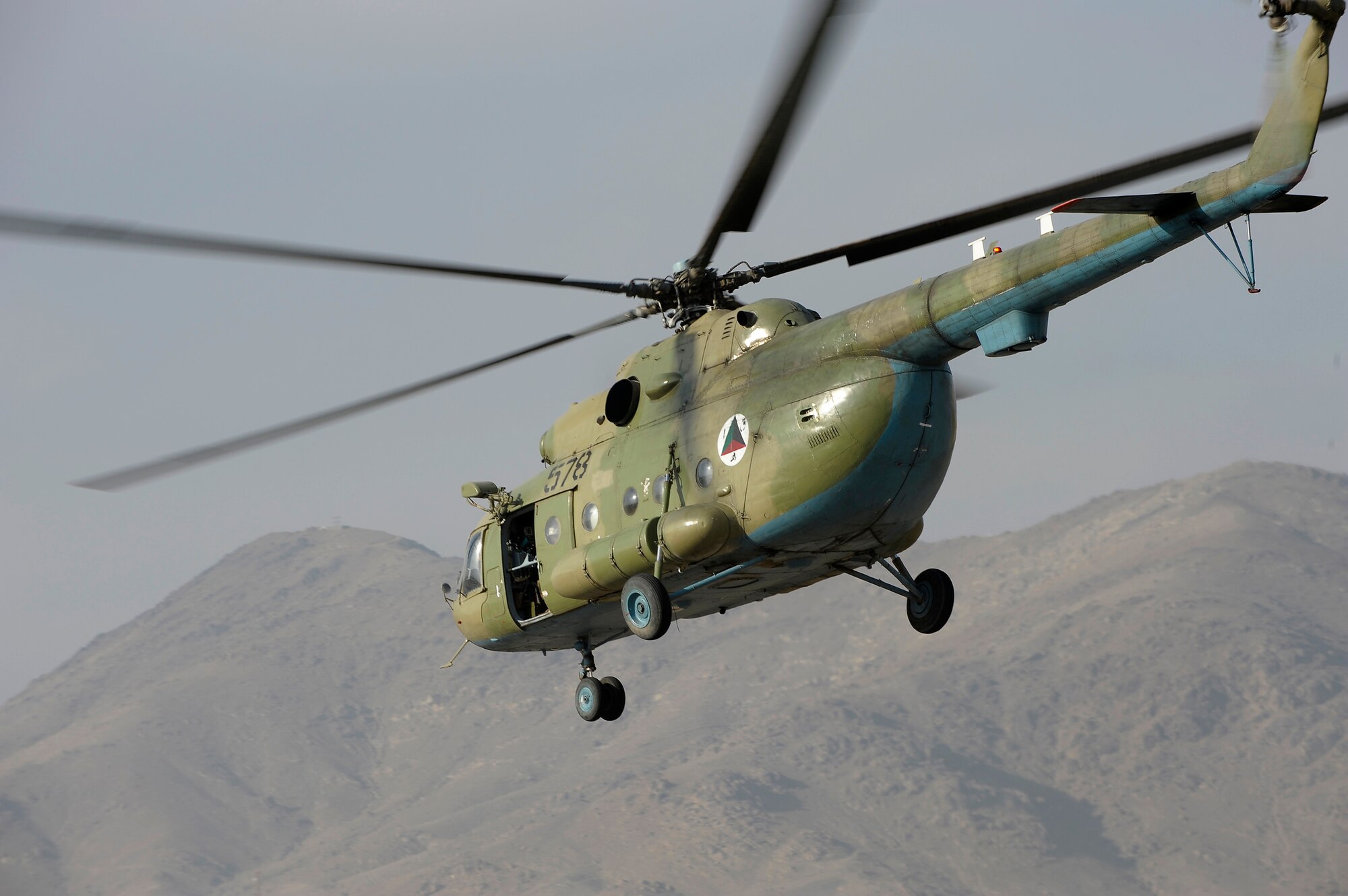 KABUL, Afghanistan -- The Afghan National Army Air Corps received three Mi-17 helicopters, like this one taking off on a mission from Kabul. The new helicopters were refurbished in the Chech Republic and transported here in a contracted AH-124 Russian transport. The three helicopters will add to the ANAAC fleet and help the Air Corps increase their missions supporting the Afghan National Army. The ANAAC is being mentored by Airman from the 438th Air Expeditionary Wing here.
(U.S. Air Force photo/Master Sgt. Keith Brown)