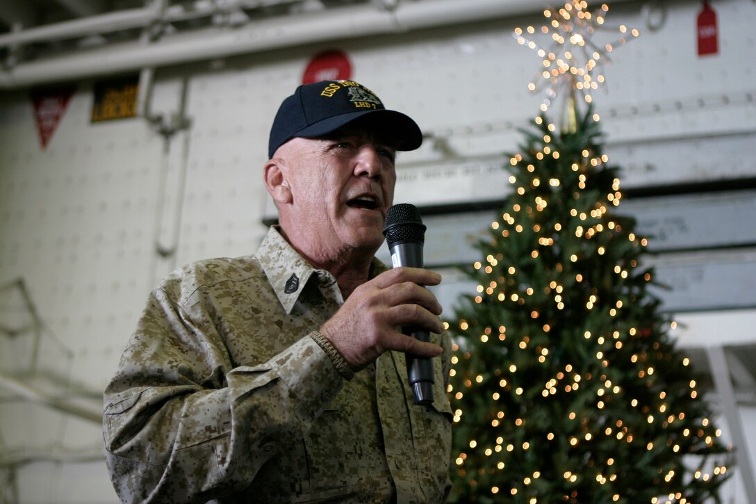 Actor and Marine Corps icon Gunnery Sgt. R. Lee Ermey speaks to Marines and sailors aboard the USS Iwo Jima in the Arabian Gulf, Dec. 8, 2008. Ermey visited the USS Iwo Jima as a Moral, Welfare and Recreation event for deployed troops during the holiday season. The 26th Marine Expeditionary Unit and Iwo Jima Strike Group are currently deployed to the 5th fleet area of operation.