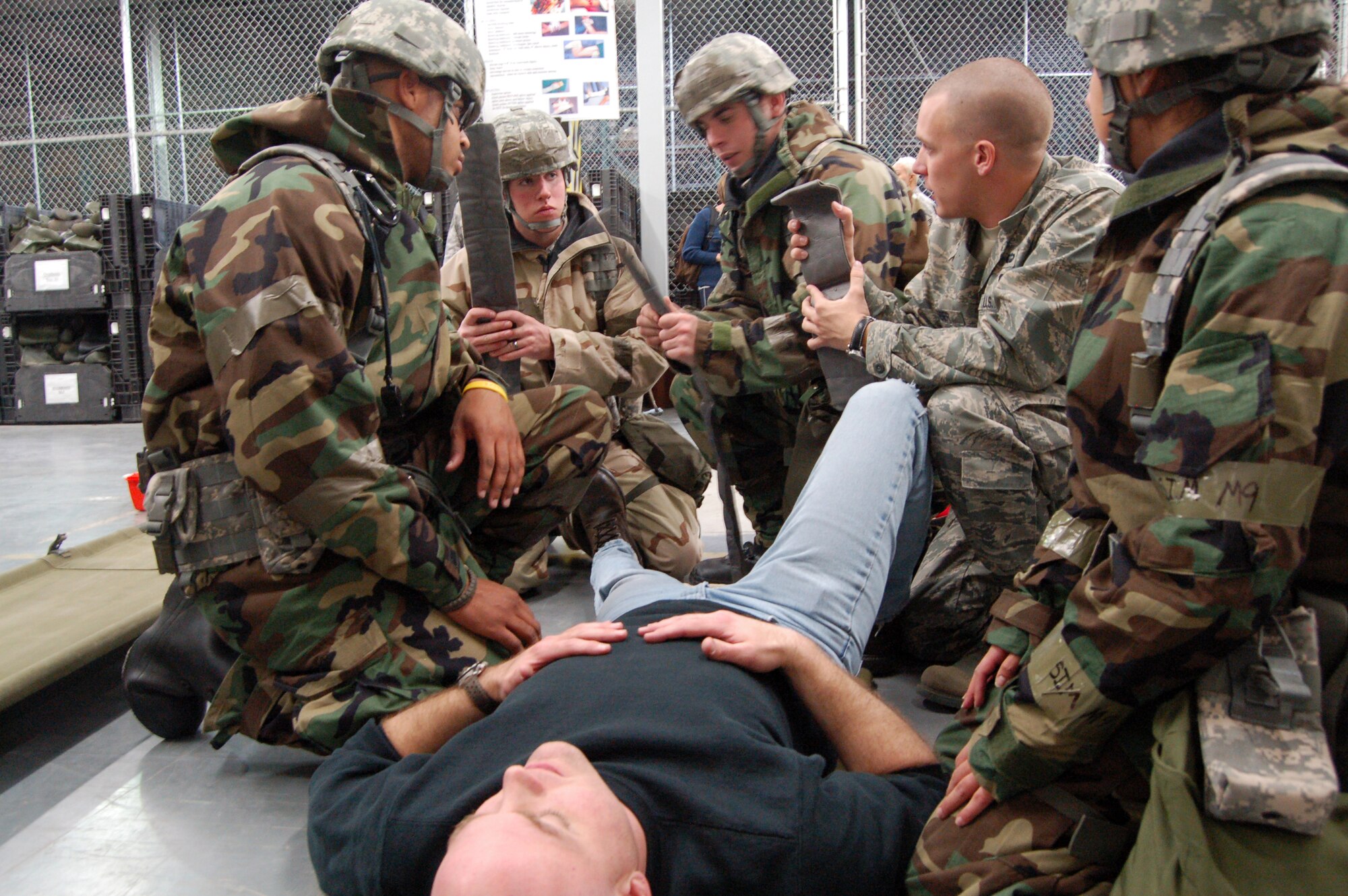 Edwards Airmen receive training on how to apply splints during a Self-Aid Buddy Care training for the Operational Readiness Exercise Dec. 4. (Air Force photo by Senior Airman Julius Delos Reyes)