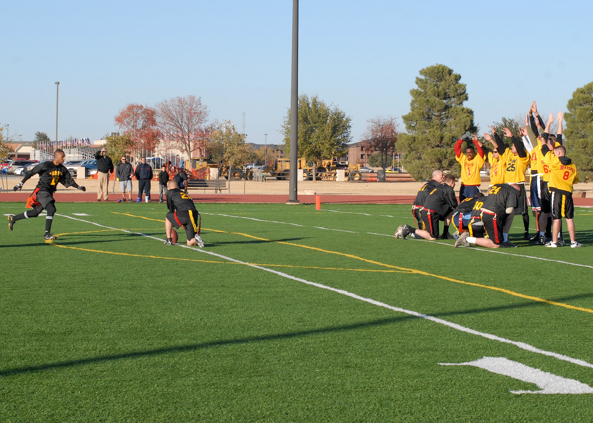The Army team attempts a field goal kick during the annual Army vs. Navy flag football game at Goodfellow Air Force Base on Dec. 5.  Navy defeated Army for the first time in 5 years with a score of 49-47.  (U.S. Air Force photo by Senior Airman Kasabyan Musal).