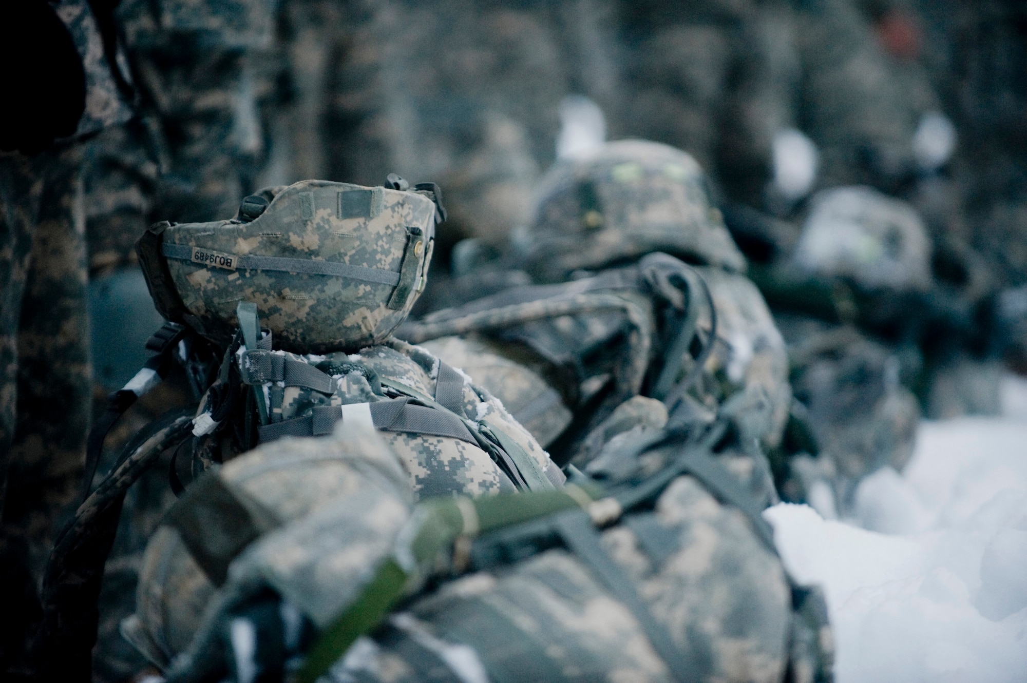 FORT RICHARDSON, Alaska -- Soldiers from the 4-25 Brigade Special Troops Battalion line up for roll call for Sustainment Airborne Training Dec. 5. The 4-25 BSTB has to go to Sustainment Airborne Training 24 hours prior to jumping. The sustainment training will go over jumping and landing procedures. (U.S. Air Force photo/Senior Airman Jonathan Steffen)