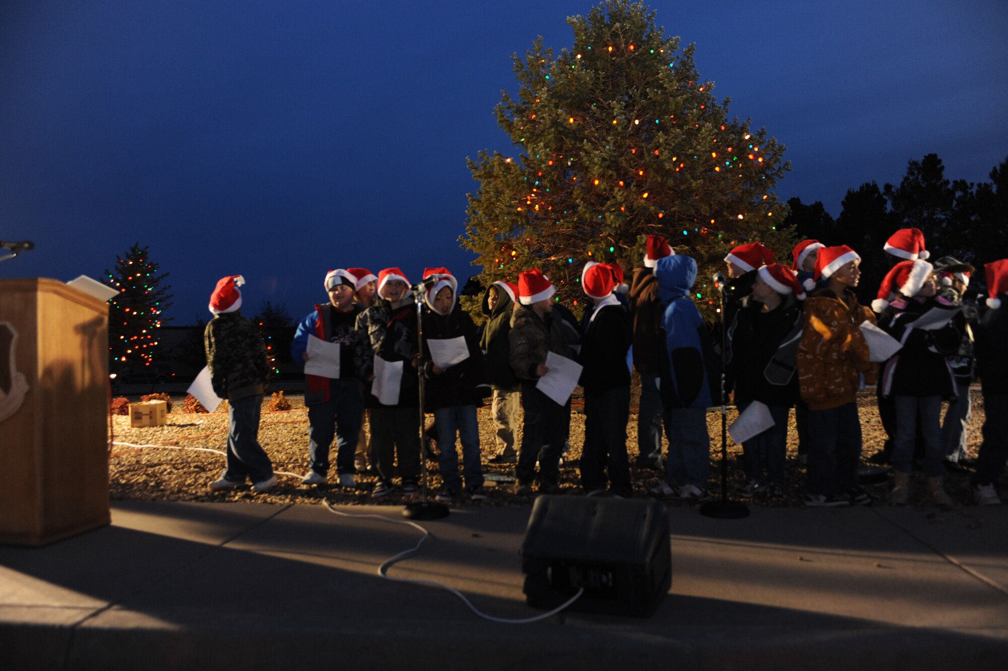 CANNON AIR FORCE BASE, N.M. - Children from the Ranchvale Elementary School watch as the tree lights up during the annual base tree lighting ceremony Dec. 4. The chapel-sponsored event helps to light up the holiday season. (U.S. Air Force photo/Airman 1st Class Evelyn Chavez)