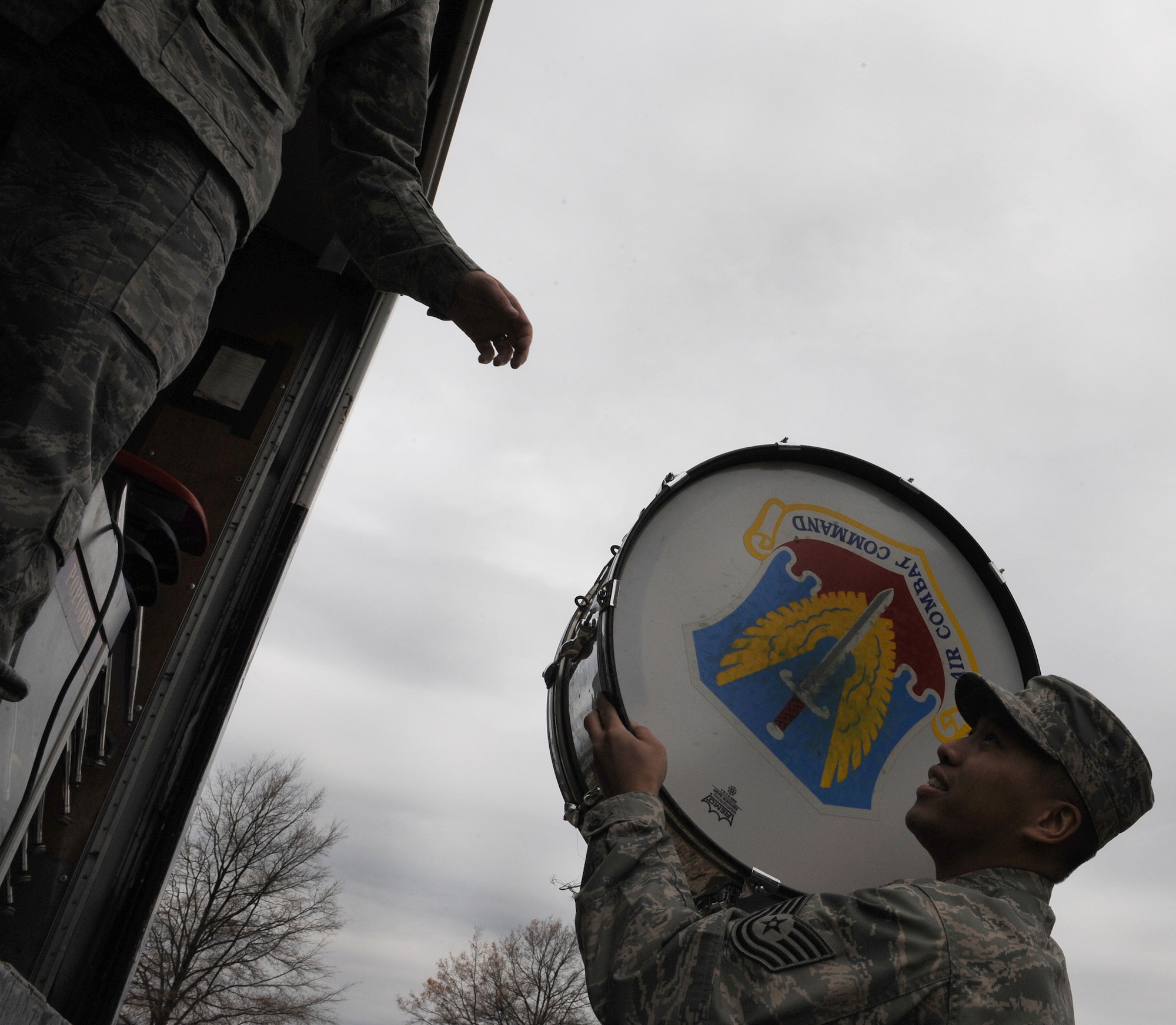 LANGLEY AIR FORCE BASE, Va. -- Tech. Sgt. Josefino N. Alegre Jr. from the 83rd Network Operations Squadron loads equipment into a truck while cleaning out the Airmen's Attic Dec. 5. Approximately 60 Airmen volunteered on the squadron's Wingman Day to move items to a storage facility allowing the Airmen's Attic to expand. (U.S. Air Force photo/Airman Rebecca Montez)