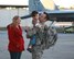 Staff Sgt. Derek LaBounty, 33rd Operations Support Squadron section chief of aircrew flight equipment, receives a welcome home hug from his step-son Nathan Rauch after returning from Iron Falcon Nov. 30. His wife, left, Amy LaBounty, and many other family members gathered at one of the 33rd Fighter Wing's hangars to greet their loved ones returning from the five-week international exercise in Southwest Asia. While on temporary duty, SSgt. LaBounty helped size and fit 24 pilots and NATO Forces commanders with aircrew flight equipment like helmets, oxygen masks, anti-G suits, torso harnesses and night vision goggles. (U.S. Air Force photo/Tech. Sgt. Eric Jacobson)