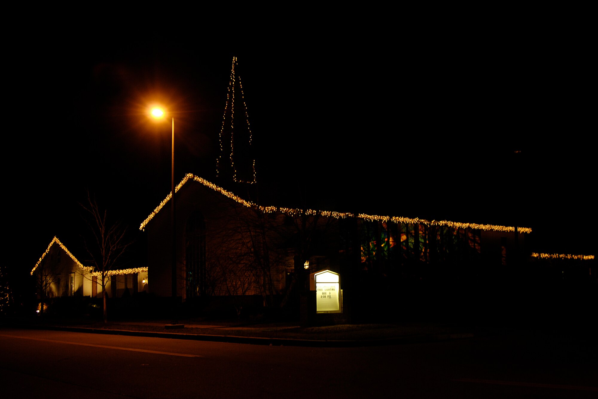 HANSCOM AIR FORCE BASE, Mass. – The Base Chapel is shown illuminated in the holiday spirit following the tree lighting ceremony that took place Dec. 3. (U.S. Air Force photo by Linda LaBonte Britt)
