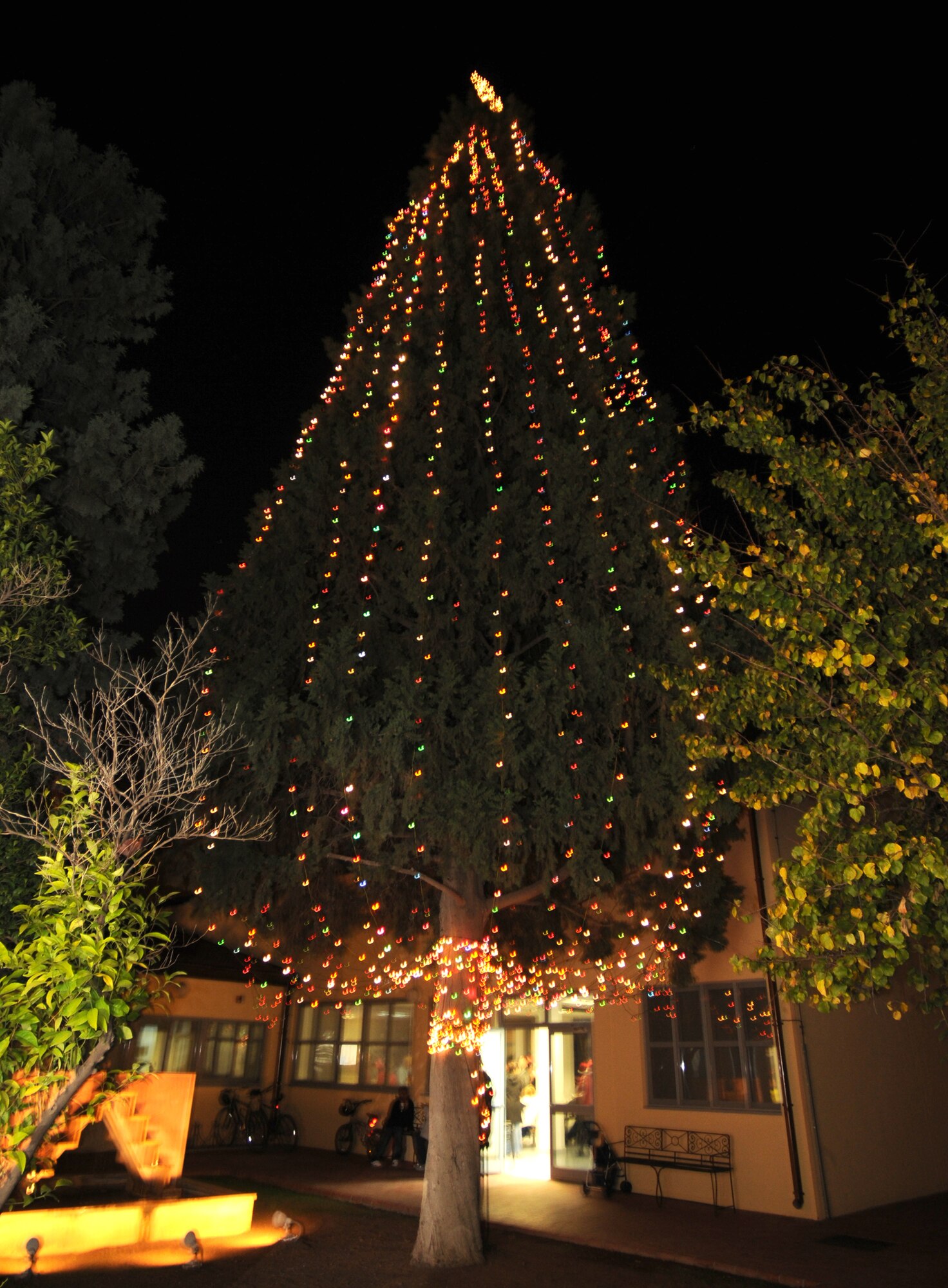 The Incirlik Christmas tree stands in front of the base chapel. The tree lighting ceremony was held to ring in the holidays with Christmas music, holiday sweets and a visit from Santa Claus. (U.S. Air Force photo by Senior Airman Heather Stanton)