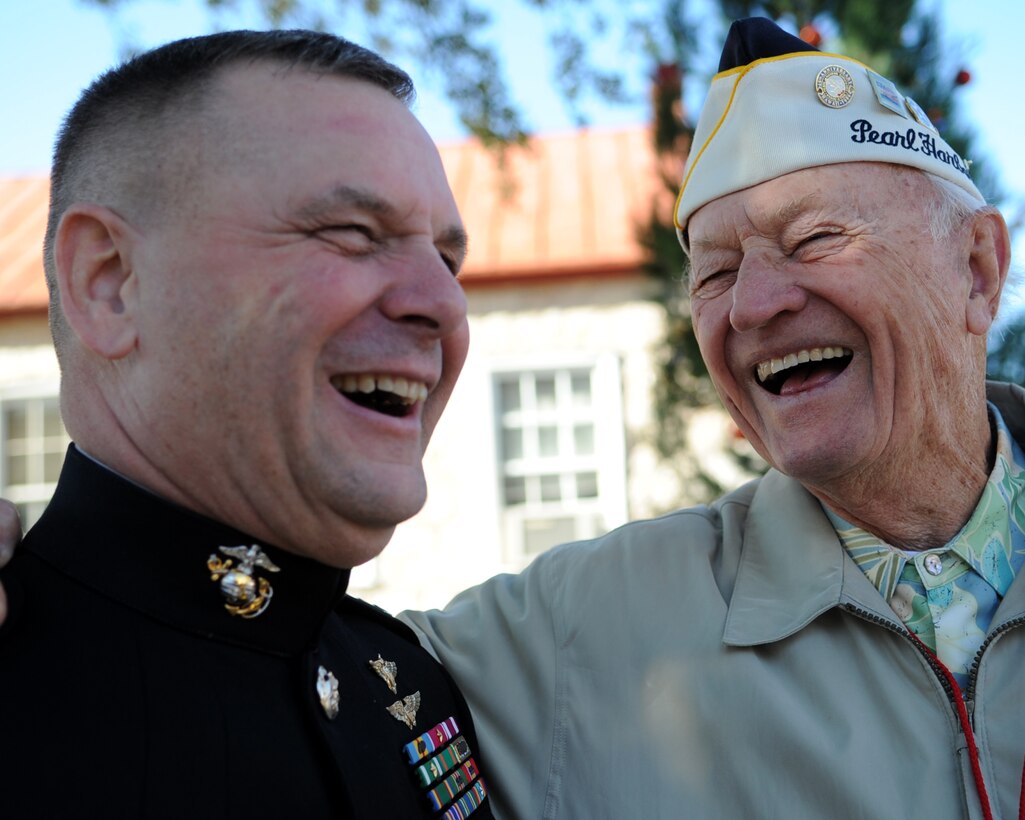 Vice Chairman of the Joint Chiefs of Staff U.S. Marine Gen. James E. Cartwright shares a laugh with World War II veteran Edwin Schuler during the Pearl Harbor Survivors Memorial Service in Fredericksburg, Texas, Dec. 7, 2008. 