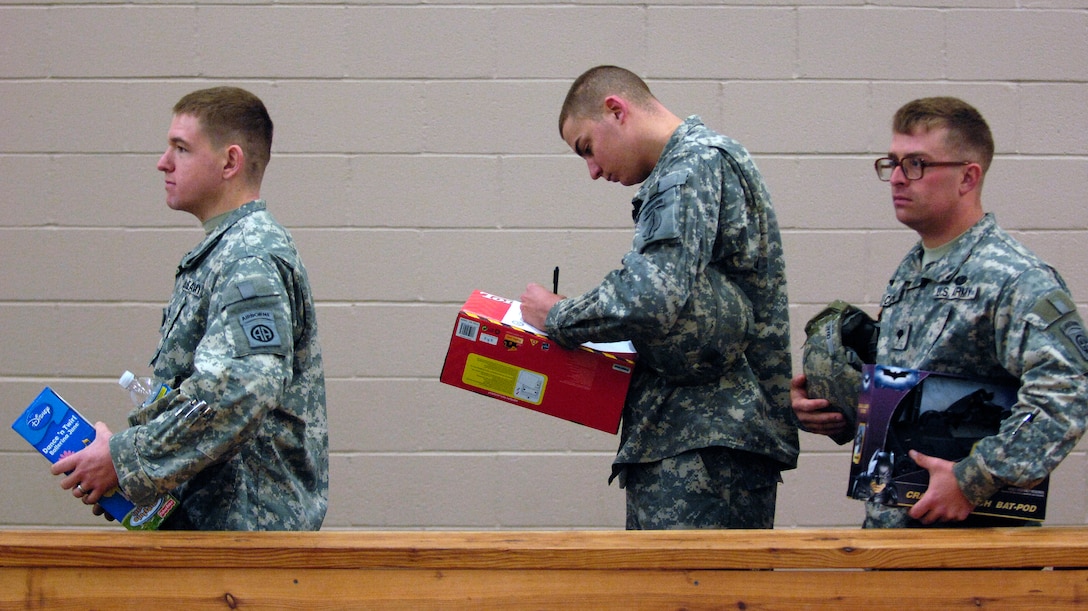 U.S. Army Soldiers Wait To Donate Toys During Operation Toy Drop On ...