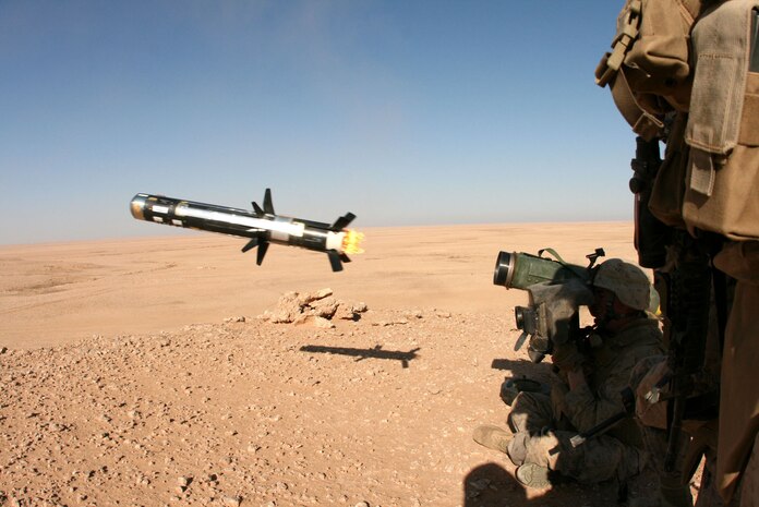 Lance Cpl. Jed Bolyard, 22, an infantryman from College Point, N.Y., fires the Javelin missile during an exercise near Al Asad Air Base, Iraq, Dec. 8.  Bolyard is with Weapons Company, 2nd Battalion, 25th Marine Regiment, Regimental Combat Team 5.  The Javelin shoot was one small part of a larger combined-arms exercise, which integrated traditional infantry elements with aviation, mortars and several anti-armor systems.  ::r::::n::