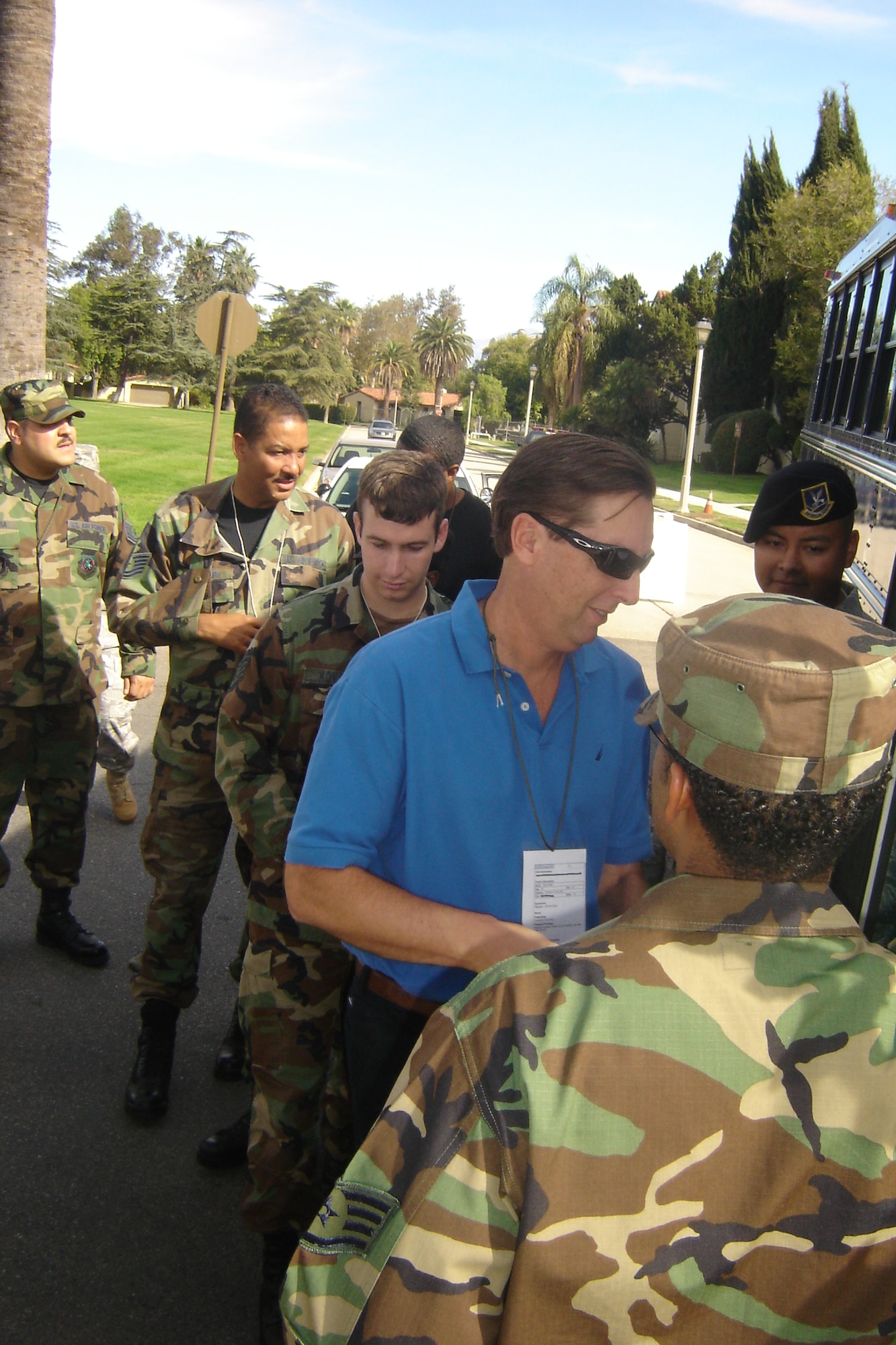 Injured personnel load onto a bus that will transport them to a medical facility for further care. (U.S. Air Force photo by Will Alexander)