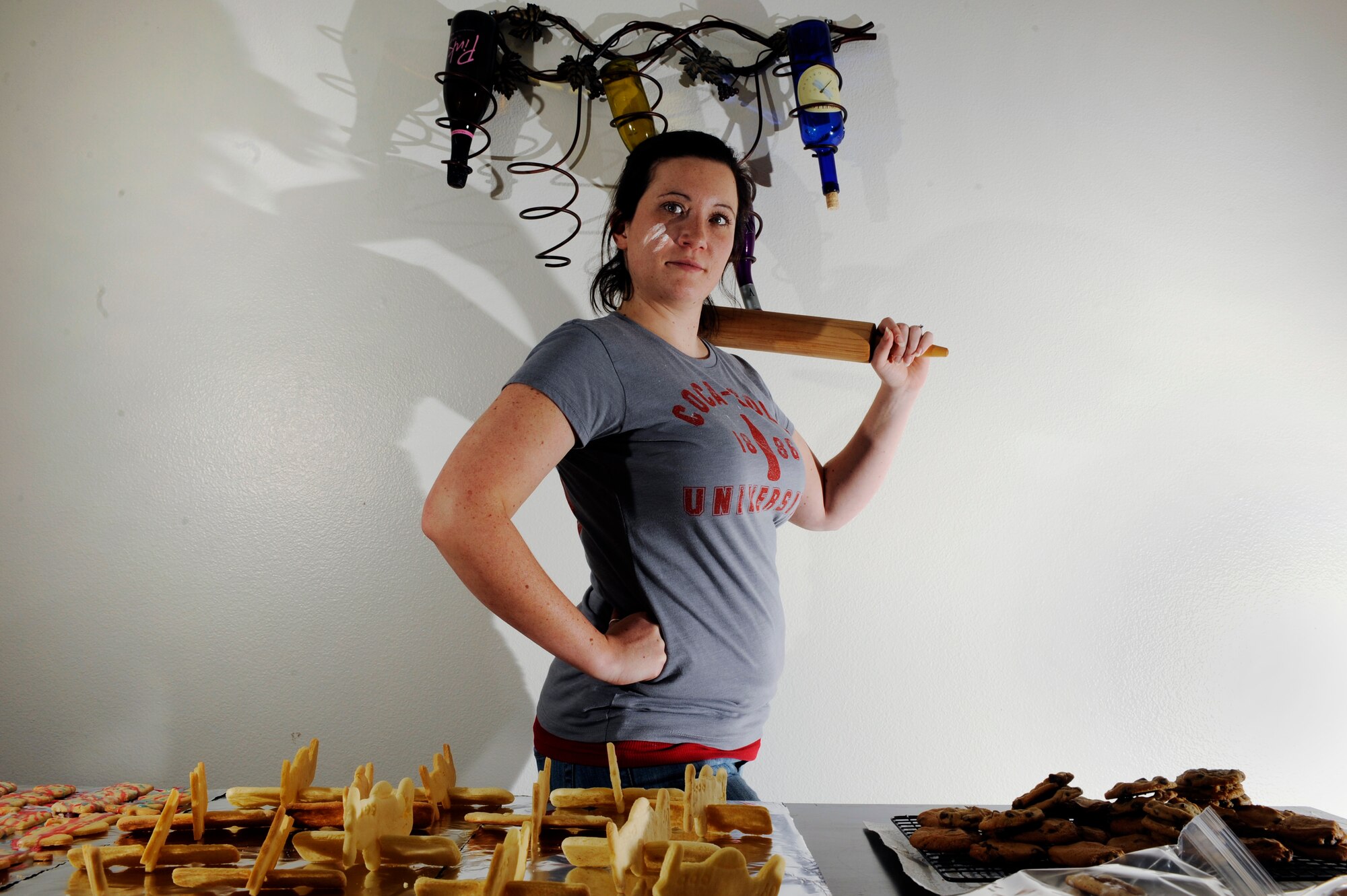 Jessica Cooley is one of many spouses on base devoting their time baking homemade cookies in preparation of Operation Cookie Crunch Dec. 9, 2008, at Eielson Air Force Base, Alaska. This is her second year participating in this event to provide cookies for more than 500 single Airmen. Cookies can be dropped off from 7 a.m. to 1 p.m. Dec. 12 at the Yukon Club.  (U.S. Air Force photo/Senior Airman Jonathan Snyder)