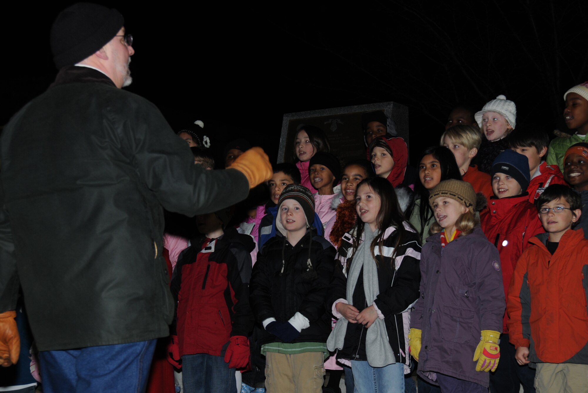 MISAWA AIR BASE, Japan -- Students from Sollars Elementary School perform Christmas carols during the annual tree lighting ceremony Dec. 5, 2008. The tree lighting ceremony kicks off the holiday season at Misawa. (U.S. Air Force photo by Senior Airman Laura R. McFarlane)