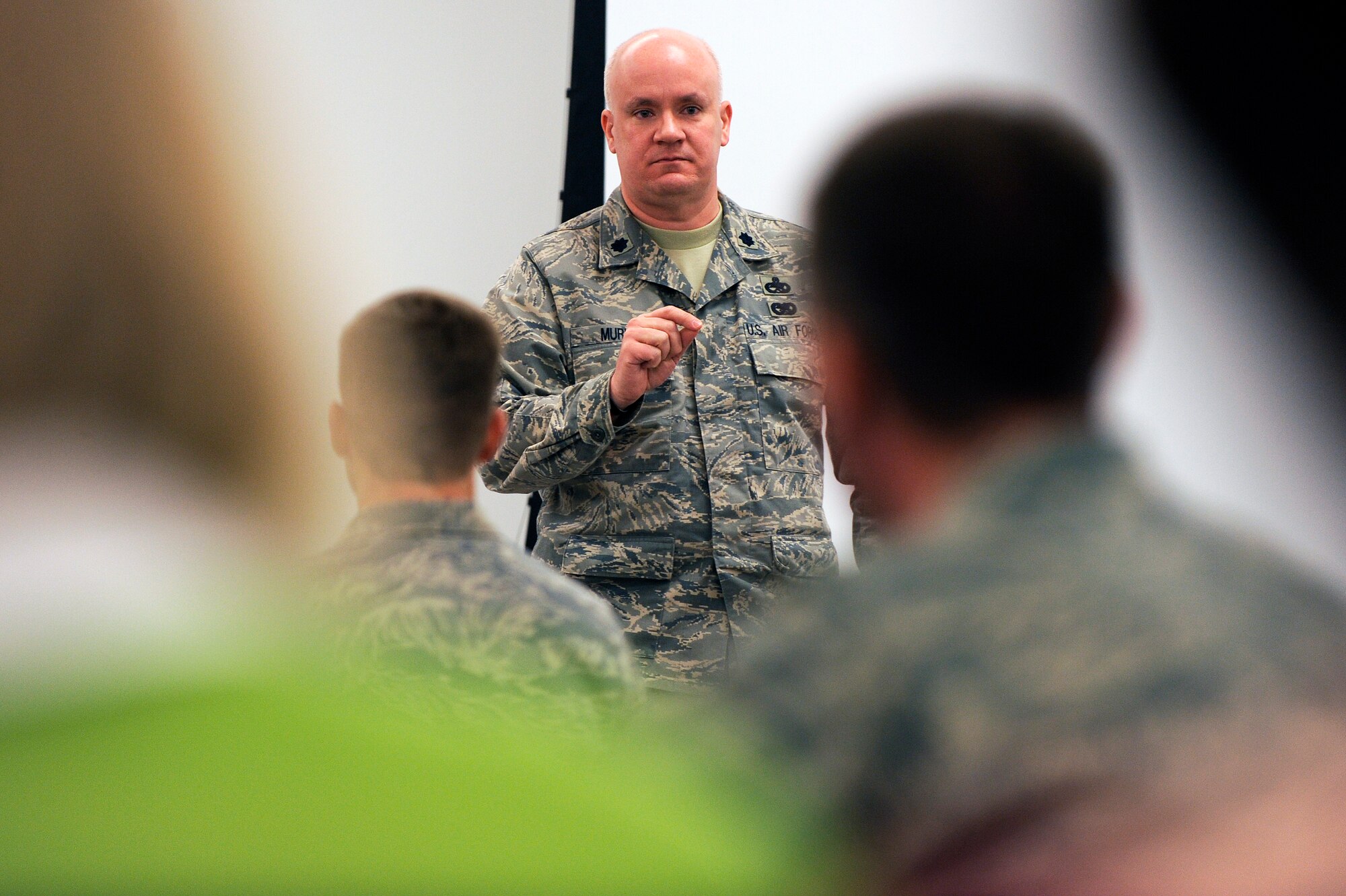 Lt. Col. Mark Murphy speaks to leadership from the 354th Fighter Wing and 168th Air Refueling Wing about his personal experience of how the Air Force aided during his time of loss Dec. 5, 2008, at Eielson Air Force Base, Alaska. The new program, Care Teams Wings of Compassion will be designed to setup volunteer staff to assist Air Force families who lost a loved one. Colonel Murphy is the deputy commander assigned to the 354th Maintenance Group.  (U.S. Air Force photo/Senior Airman Jonathan Snyder)