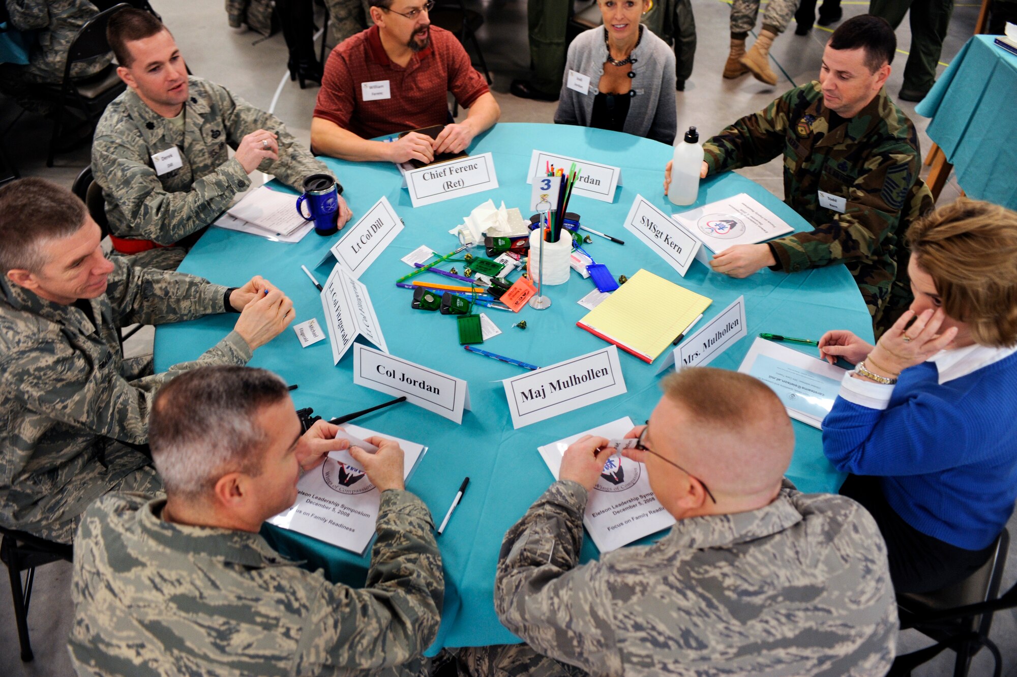Leadership from the 354th Fighter Wing and 168th Air Refueling Wing gather together to discuss the foundation of a new program, Care Teams Wings of Compassion Dec. 5, 2008, at Eielson Air Force Base, Alaska. The program will be designed to setup volunteer staff to assist Air Force families who lost a loved one.  (U.S. Air Force photo/Senior Airman Jonathan Snyder)