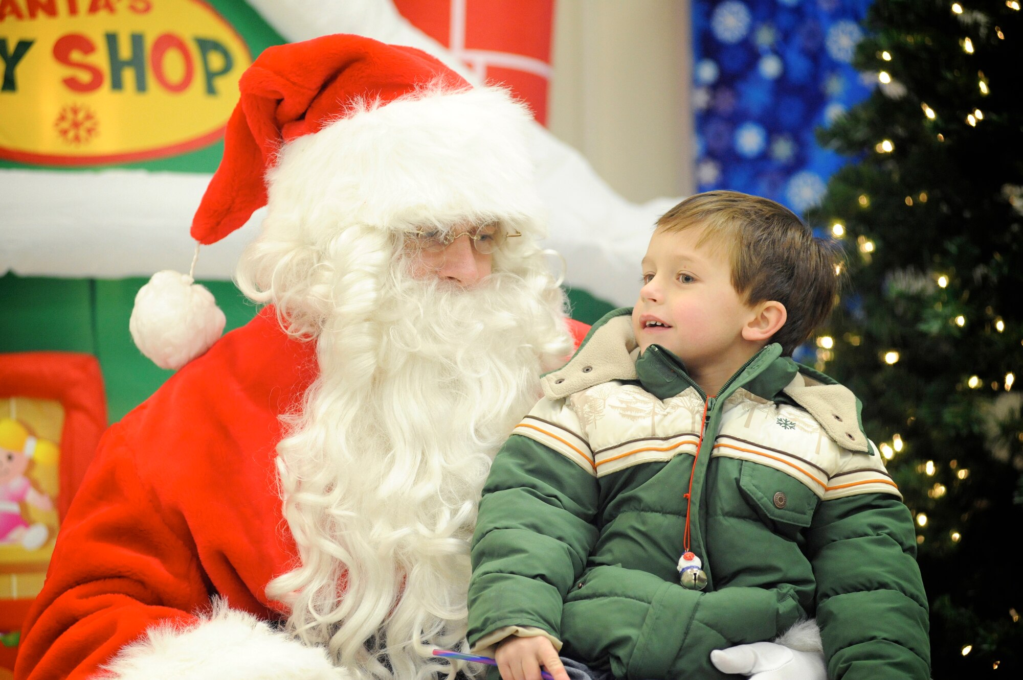 After the base's annual tree lighting ceremony, children had the opportunity to visit with Santa and snack on cookies and other treats. The event was held Dec. 5 at Chapel One, McGuire Air Force Base, N.J. (U.S. Air Force photo/Carlos Cintron)