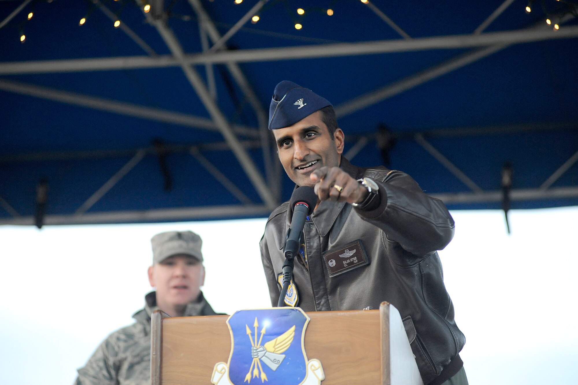 Col. Balan Ayyar, 305th Air Mobility Wing commander, welcomes the crowd to the annual tree lighting ceremony at Chapel One Dec. 5 at McGuire Air Force Base, N.J.  The event featured holiday music and refreshments and a visit from Santa Claus. (U.S. Air Force photo/Carlos Cintron)