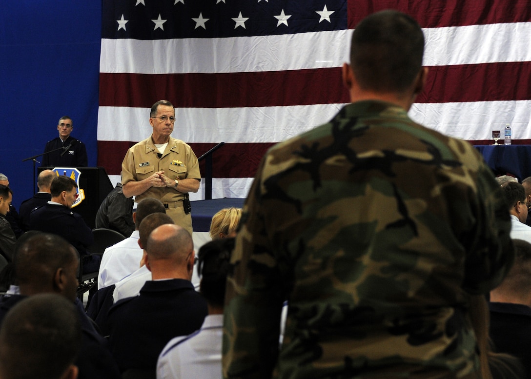 LANGLEY AIR FORCE BASE, Va. -- Adm. Michael Mullen, chairman of the Joint Chiefs of Staff answers an Airman's question Dec. 8. While visiting Langley, Admiral Mullen held an "All Hands" call to meet Airmen and answer their questions. (U.S. Air Force photo/Airman 1st Class Jonathan Koob)