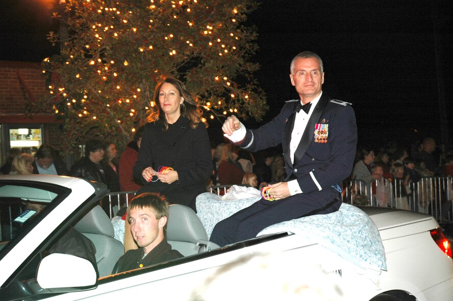 Col. Steven Chapman, 919th Special Operations Wing Commander, along with spouse Janet, participate in the Christmas Day Parade held on Dec. 5. The Christmas -parade, held in Crestview Fla., gives members of the military a chance to show appreciation to the members of the community.