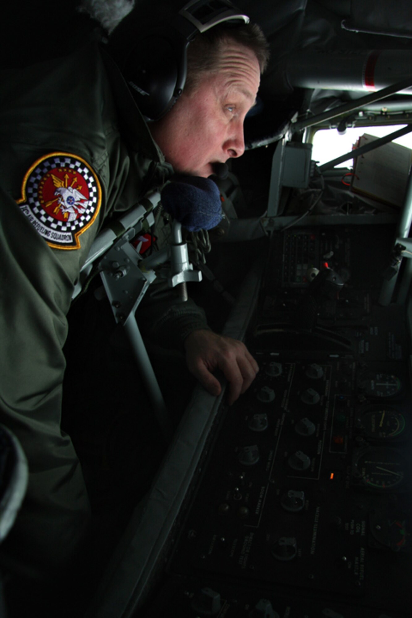 GRISSOM AIR RESERVE BASE, Ind. -- Air Force Reservist Master Sgt. Doug Preece, 74th Air Refueling Squadron inflight refueling specialist, maneuvers a refueling boom as a C-5 Galaxy approaches. (U.S. Air Force photo/Staff Sgt. Mark R. W. Orders-Woempner)