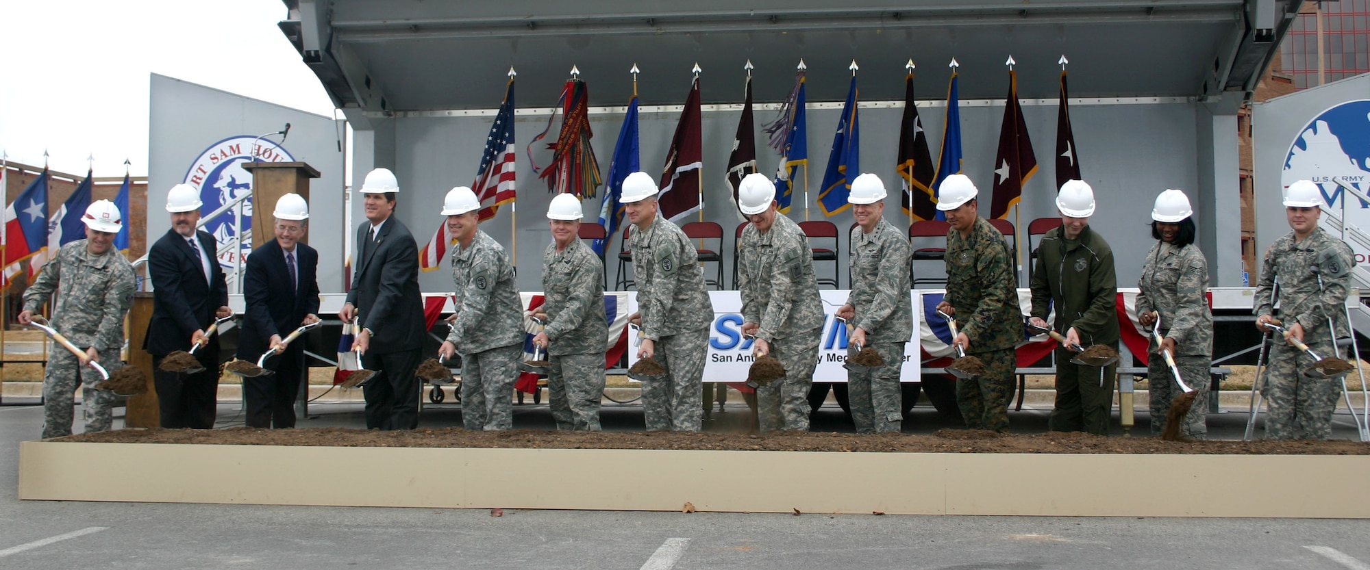Air Force and Army military leaders, construction officials and wounded warriors break ground Dec. 8 on a $724 million project that will unify Brooke Army Medical Center, or SAMMC-North, and Wilford Hall Medical Center, or SAMMC-South. The project will expand BAMC, renovate WHMC, boost the San Antonio economy, enhance medical care and consolidate medical education and training for the Air Force, Army, Navy, Marines and Coast Guard. (U.S. Air Force Photo/Linda Frost)
