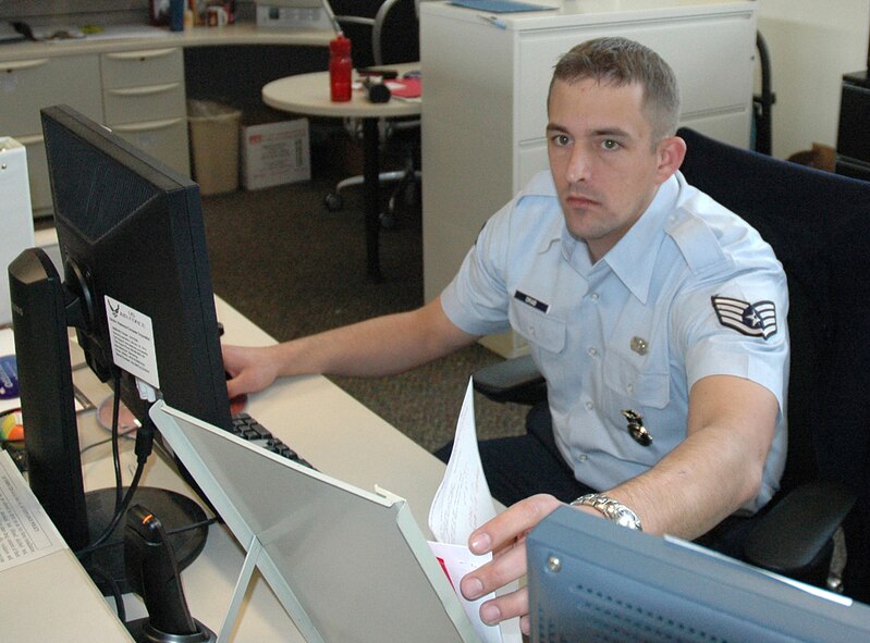 Staff. Sgt. Casey Drab, an Air Force Reserve security forces journeyman with the 446th Security Forces Squadron, works at Pass & I.D. to support the active-duty's 62nd Security Forces Squadron.  Sergeant Drab has eight years of military service. His reason for staying in the Reserve: "Camaraderie of my squadron."  Sergeant Drab is one of 2,400 Citizen Airmen serving our nation in the 446th Airlift Wing at McChord Air Force Base, Wash. (U.S. Air Force photo/Tech. Sgt. Jake Chappelle)