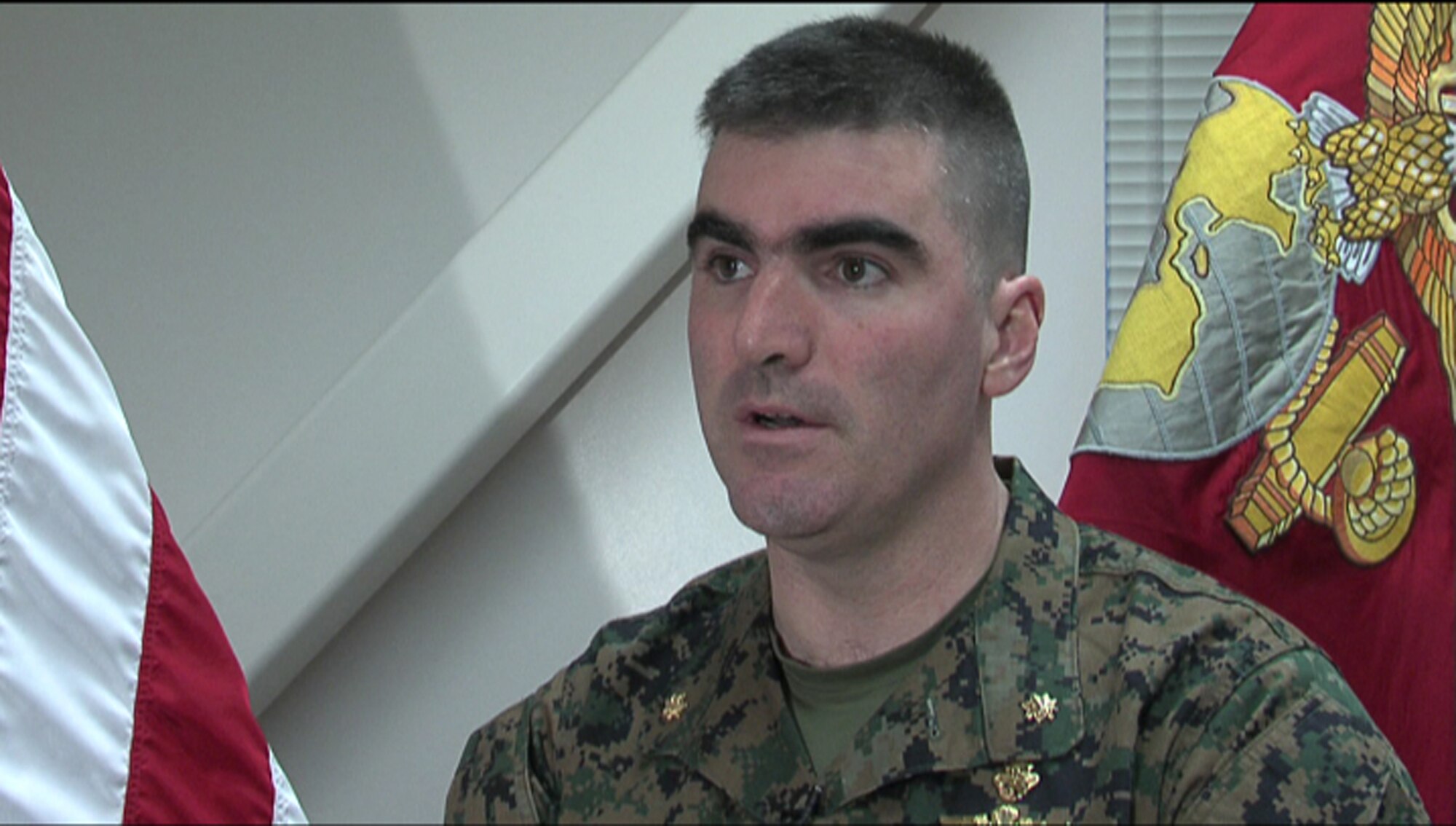 Marine Maj. William Allen speaks during his on-camera interview. (U.S. Air Force photo)