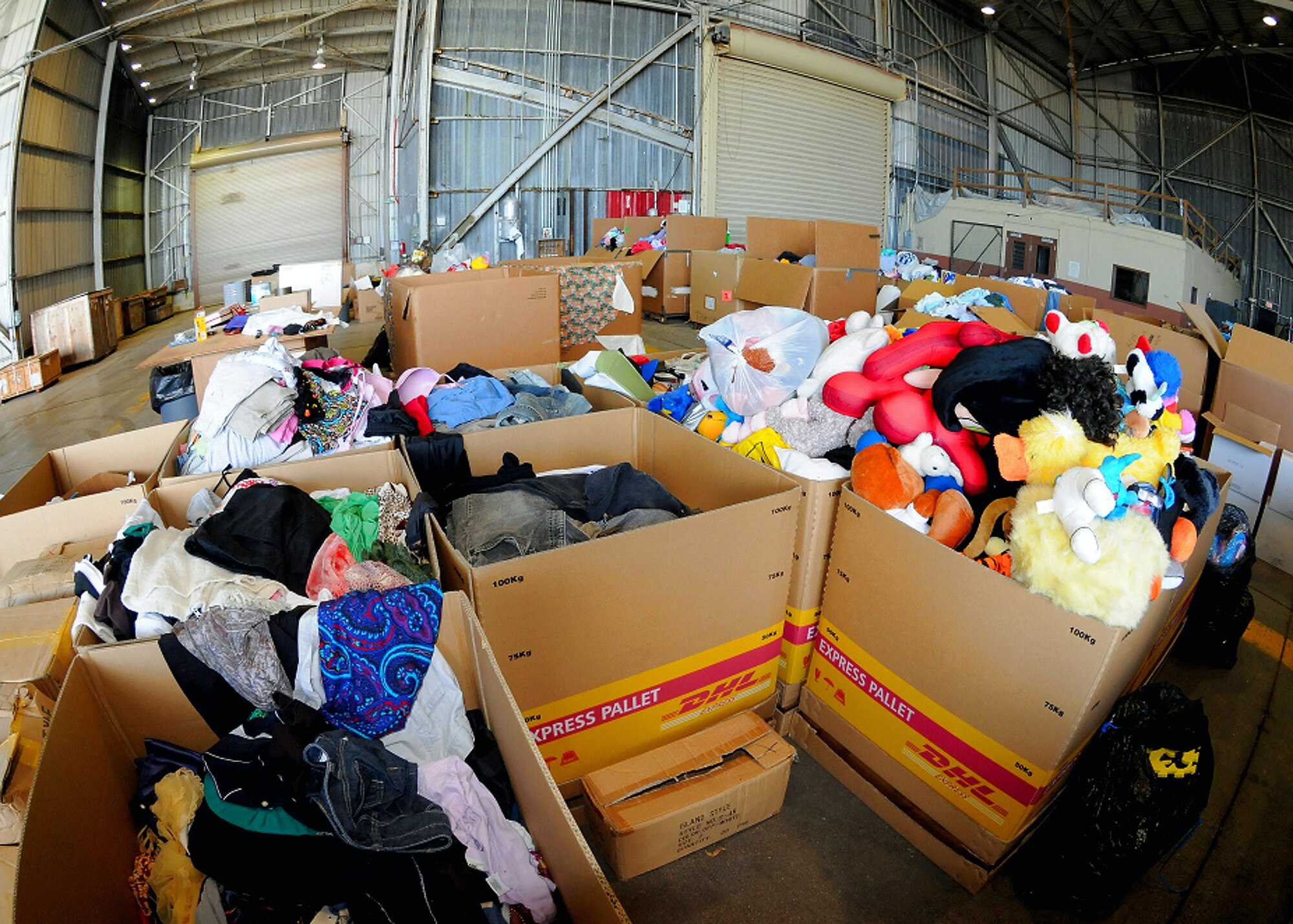 More than 186 boxes are filled with toys, first aid kits, food and supplies Dec. 7 at Andersen Air Force Base, Guam, during the Operation Christmas Drop final box build. Christmas Drop is the longest running humanitarian campaign in the world and this year marks it 56th year in operation.(U.S. Air Force photo/Senior Airman Nichelle Griffiths)