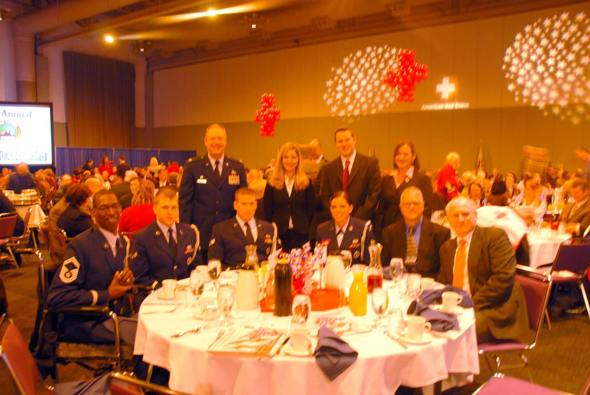 Colonel Kevin W. Bradley, 174th Fighter Wing Commander, poses with members of the 174th Base Honor Guard at a Red Cross Real Heroes Breakfast on Wednesday, December 3, 2008 at the Oncenter Convention Center in Downtown Syracuse, NY.  The honor guard was presented the award for the Military Hero.  The primary mission of the base honor guard is to provide military funeral honors for active duty, retired members, and veterans.  The 174th Fighter Wing Base Honor Guard consists of 52 volunteers from Hancock Field.