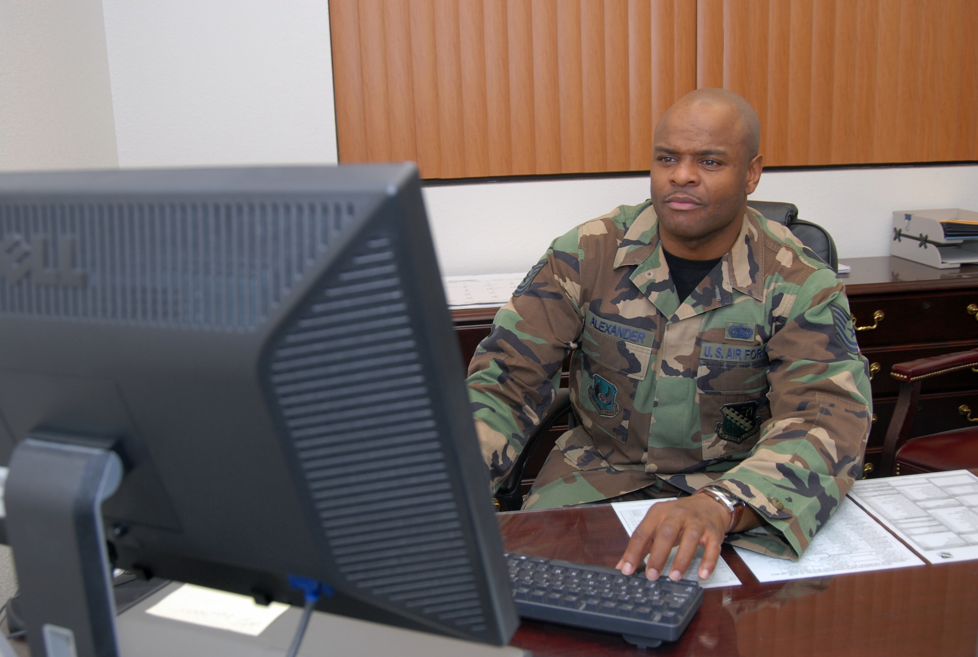 Tech. Sgt. Rondale Alexander, noncommissioned officer in charge of Air Force Flight Test Center command section, rendered first aid to two victims after a vehicle accident in Lancaster, Calif., Dec. 7. One victim was transported and the other air evacuated to local hospitals.  (Air Force photo by Senior Airman Julius Delos Reyes)