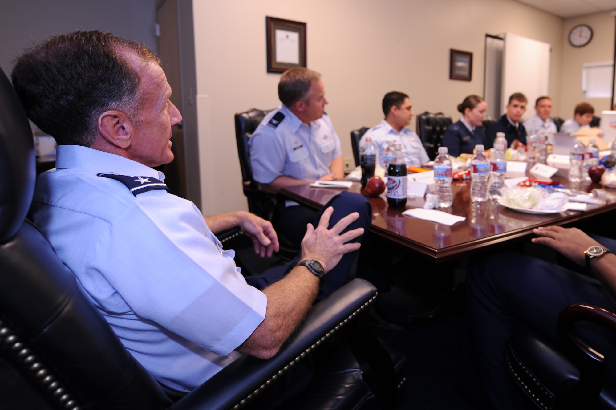 CREECH AFB Nev. -- Lt. Gen. Norman Seip, 12th Air Force (Air Forces Southern) commander, and Col. Chris  Chambliss, 432d Wing and 432d Air Expeditionary Wing commander, (left)  sit with Airmen during a luncheon at Creech Air Force Base, Dec.  8. The visit was General Seip’s fourth visit to Creech to get a first-hand look at current operations and quality of life here.  (U.S. Air Force photo/Airman 1st Class Stephanie Rubi)
