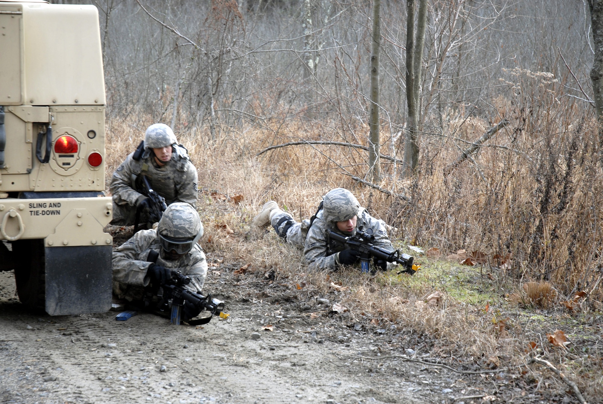 Students in the Air Force Phoenix Warrior Training Course responds to "enemy action" during mounted and dismounted patrol (convoy) training on a Fort Dix, N.J., range Dec. 5, 2008.  The course, taught by the U.S. Air Force Expeditionary Center's 421st Combat Training Squadron, prepares Air Force security forces for upcoming deployments.  (U.S. Air Force Photo/Staff Sgt. Paul R. Evans)