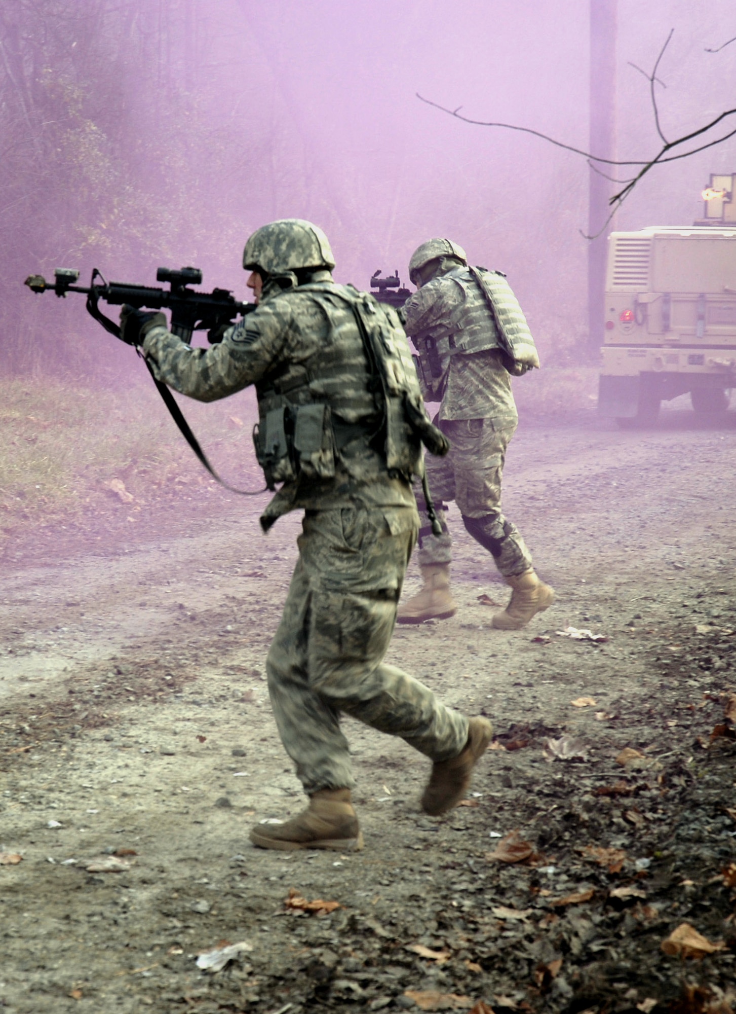 Students in the Air Force Phoenix Warrior Training Course responds to "enemy action" during mounted and dismounted patrol (convoy) training on a Fort Dix, N.J., range Dec. 5, 2008.  The course, taught by the U.S. Air Force Expeditionary Center's 421st Combat Training Squadron, prepares Air Force security forces for upcoming deployments.  (U.S. Air Force Photo/Staff Sgt. Paul R. Evans)