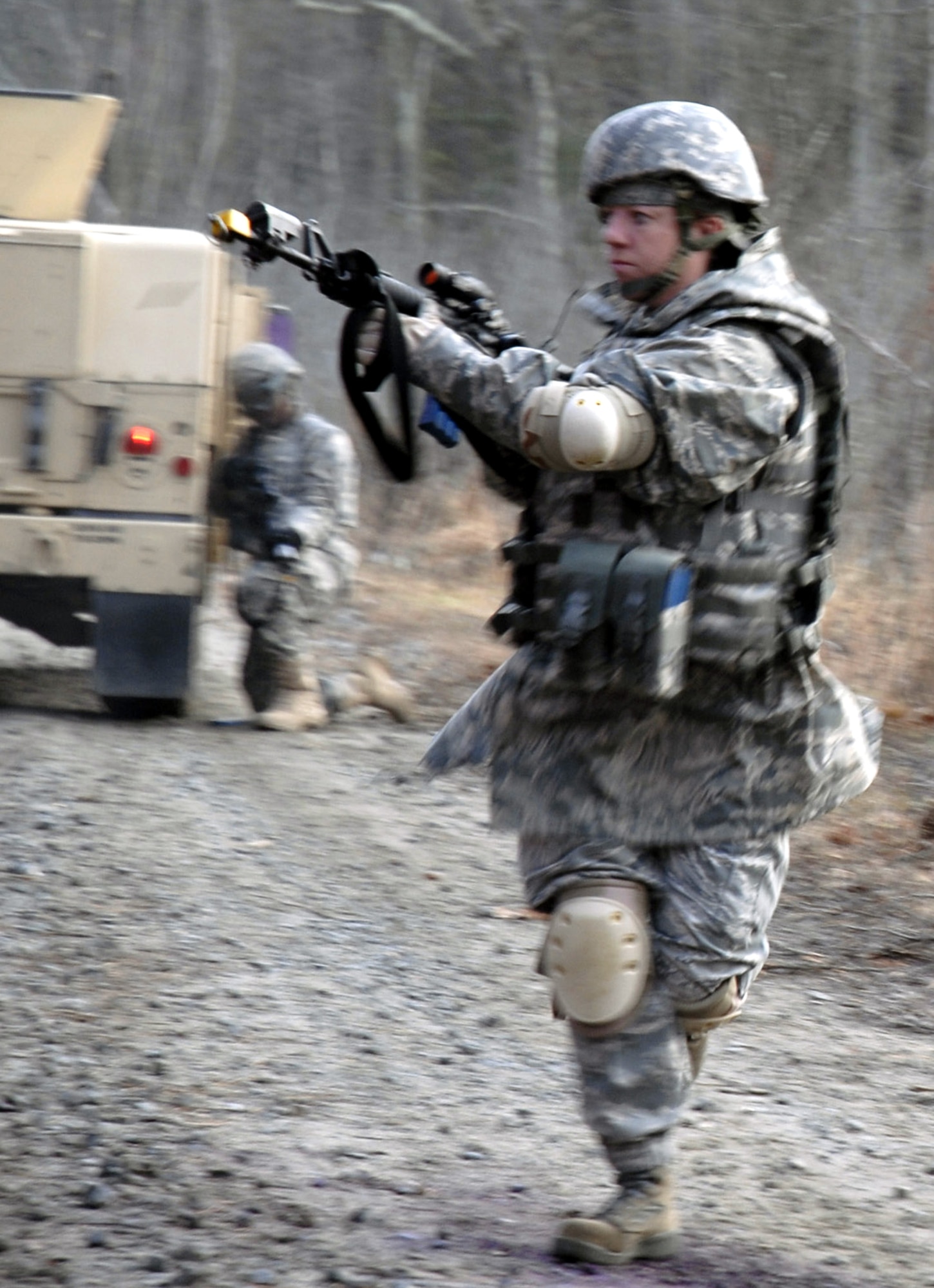 A student in the Air Force Phoenix Warrior Training Course responds to "enemy action" during mounted and dismounted patrol (convoy) training on a Fort Dix, N.J., range Dec. 5, 2008.  The course, taught by the U.S. Air Force Expeditionary Center's 421st Combat Training Squadron, prepares Air Force security forces for upcoming deployments.  (U.S. Air Force Photo/Staff Sgt. Paul R. Evans)