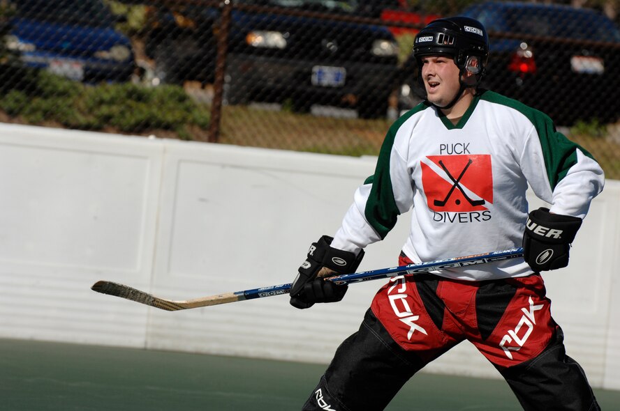 HURLBURT FIELD, Fla. -- Senior Airman Brian Wendt, 1st Special Operations Security Forces Squadron, plays defense during a game against the South Florida Samurai Squirrels here, Nov. 8. Roller hockey is the newest addition to Hurlburt?s intramural sports program and is available to Department of Defense identification card holders. (U.S. Air Force photo /Senior Airman Julianne Showalter)